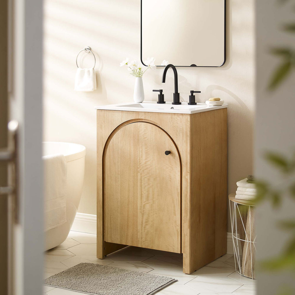 Warm oak finish and sculpted arch bring organic charm to a modern bath || EEI-6788-OAK-WHI || front_angle_room