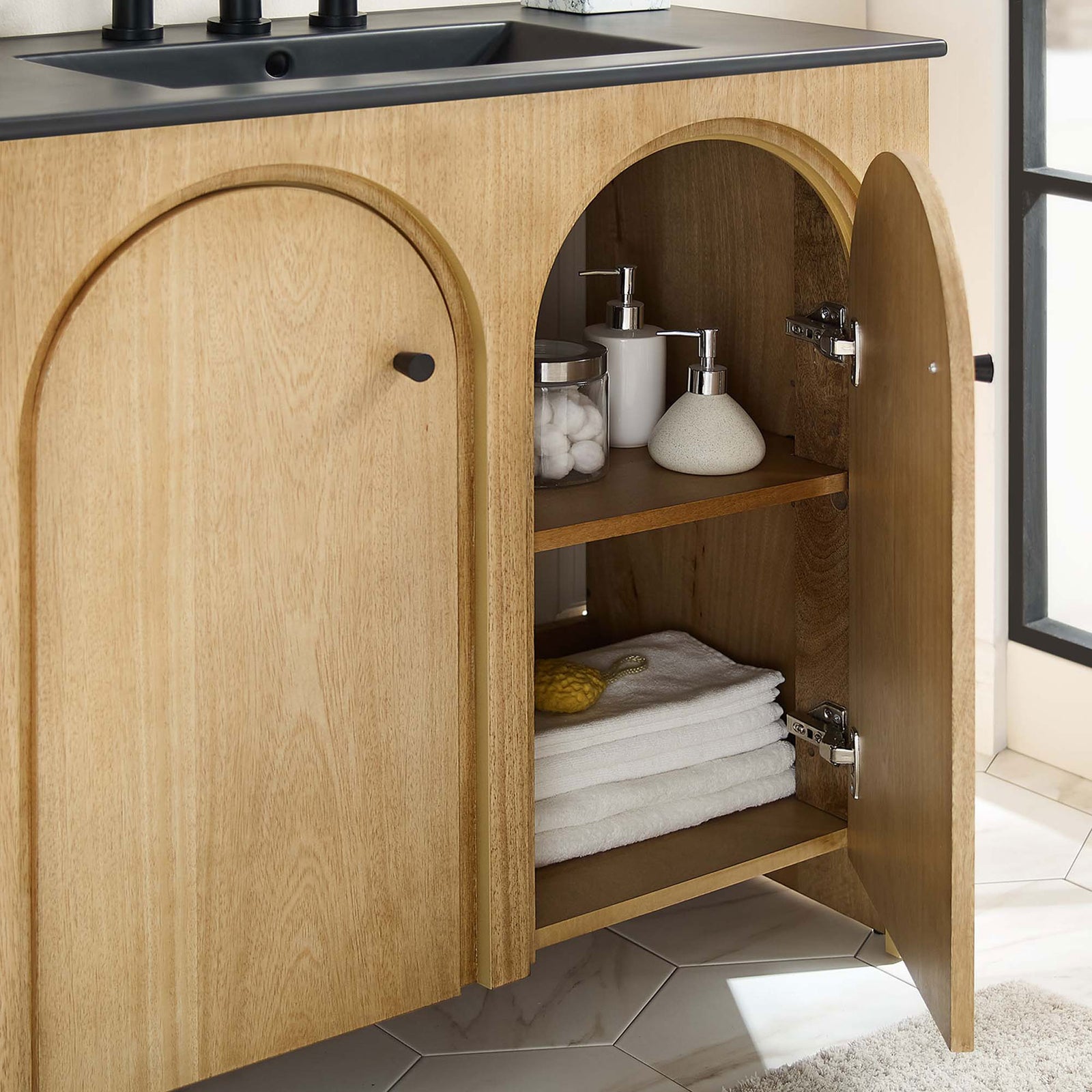 Spacious interior storage with adjustable shelf keeps towels and essentials neatly organized. || EEI-6791-OAK-BLK || storage_open_room