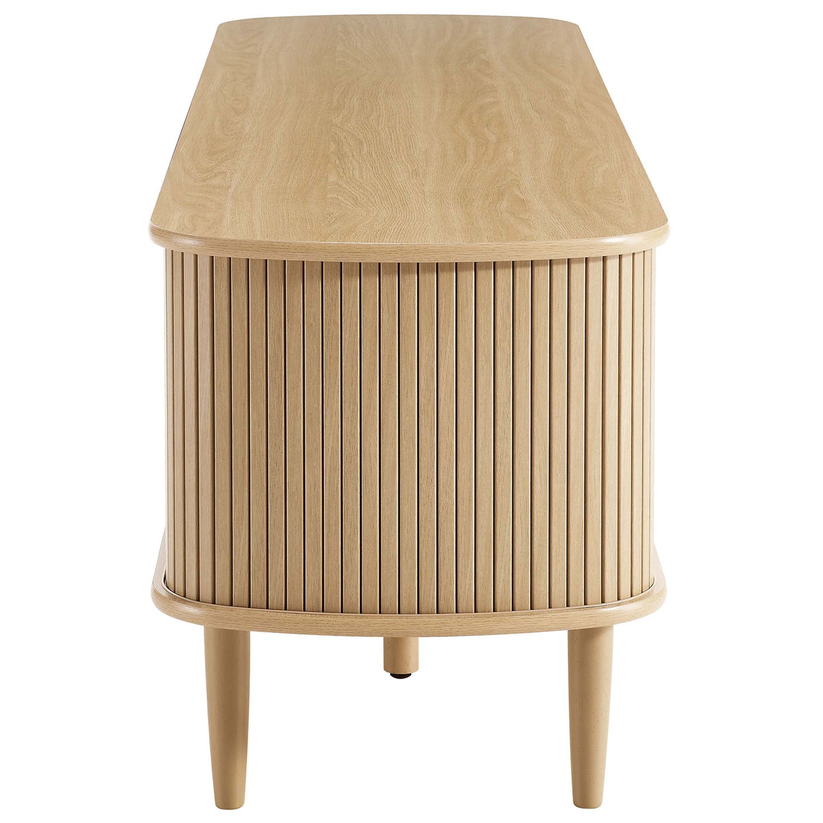 Rounded end of the oak TV cabinet shows continuous vertical slat detailing || EEI-6795-OAK || side_studio