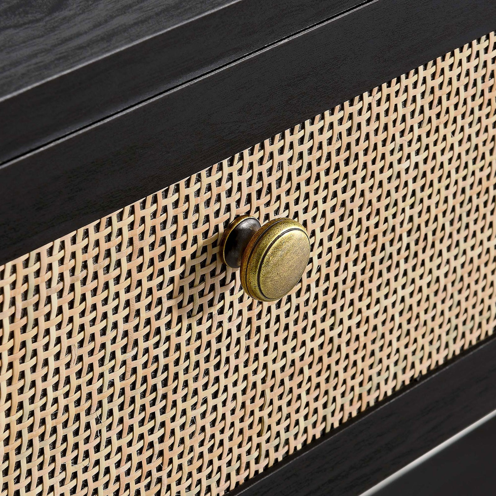 Antique brass knob and cane rattan drawer front add a warm, organic touch || EEI-6797-BLK || handle_studio