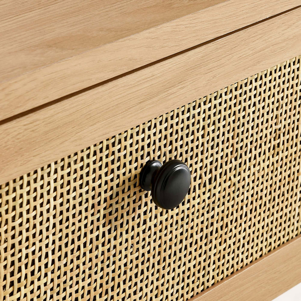 Textured rattan weave with a classic black knob adds organic charm to the drawers. || EEI-6797-OAK || handle_studio