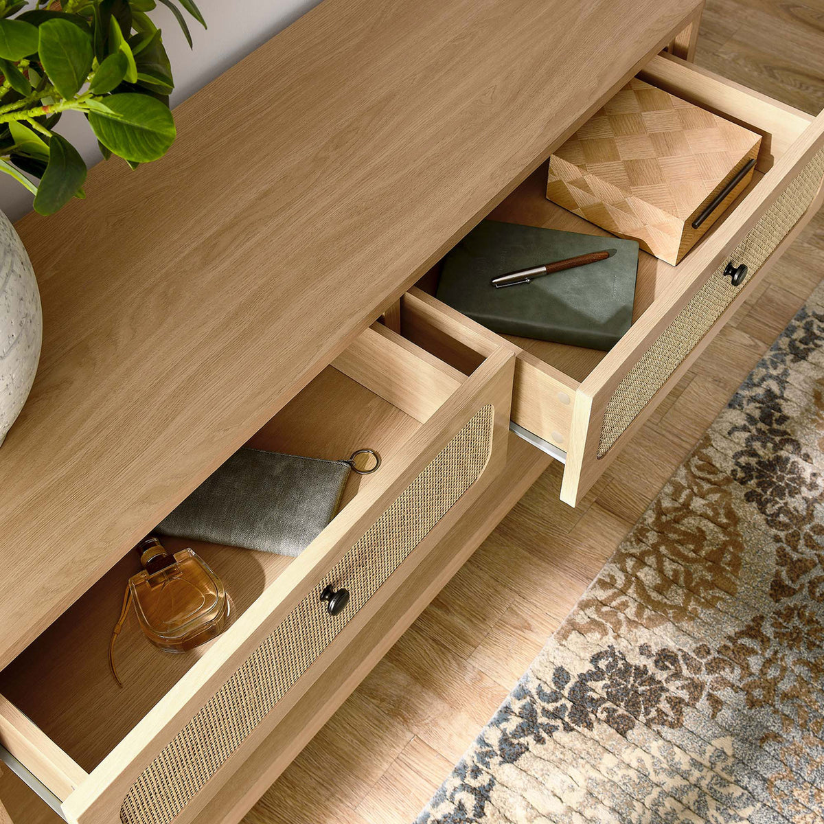 Drawers keep essentials out of sight while the lower shelf displays decor in a welcoming entryway. || EEI-6797-OAK || storage_open_room