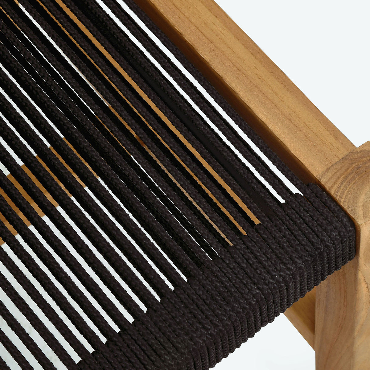 Tightly woven black rope seat wraps smoothly around the teak frame for lasting comfort and support || EEI-6805-NAT-BLK || detail_studio