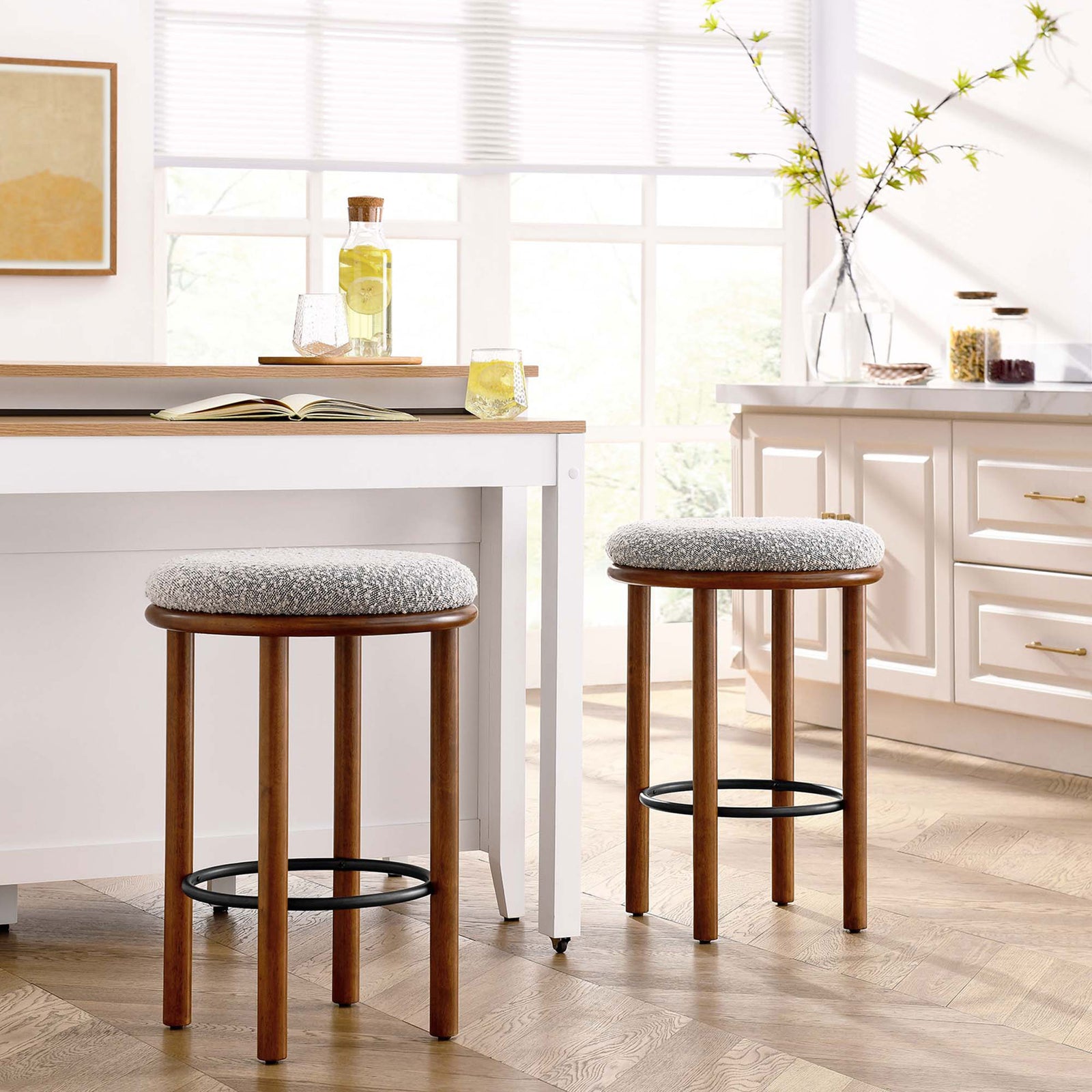 Set of two counter stools elevate a bright kitchen with warm walnut wood and cozy taupe boucle || EEI-6818-WAL-TAU || front_angle_multi_room