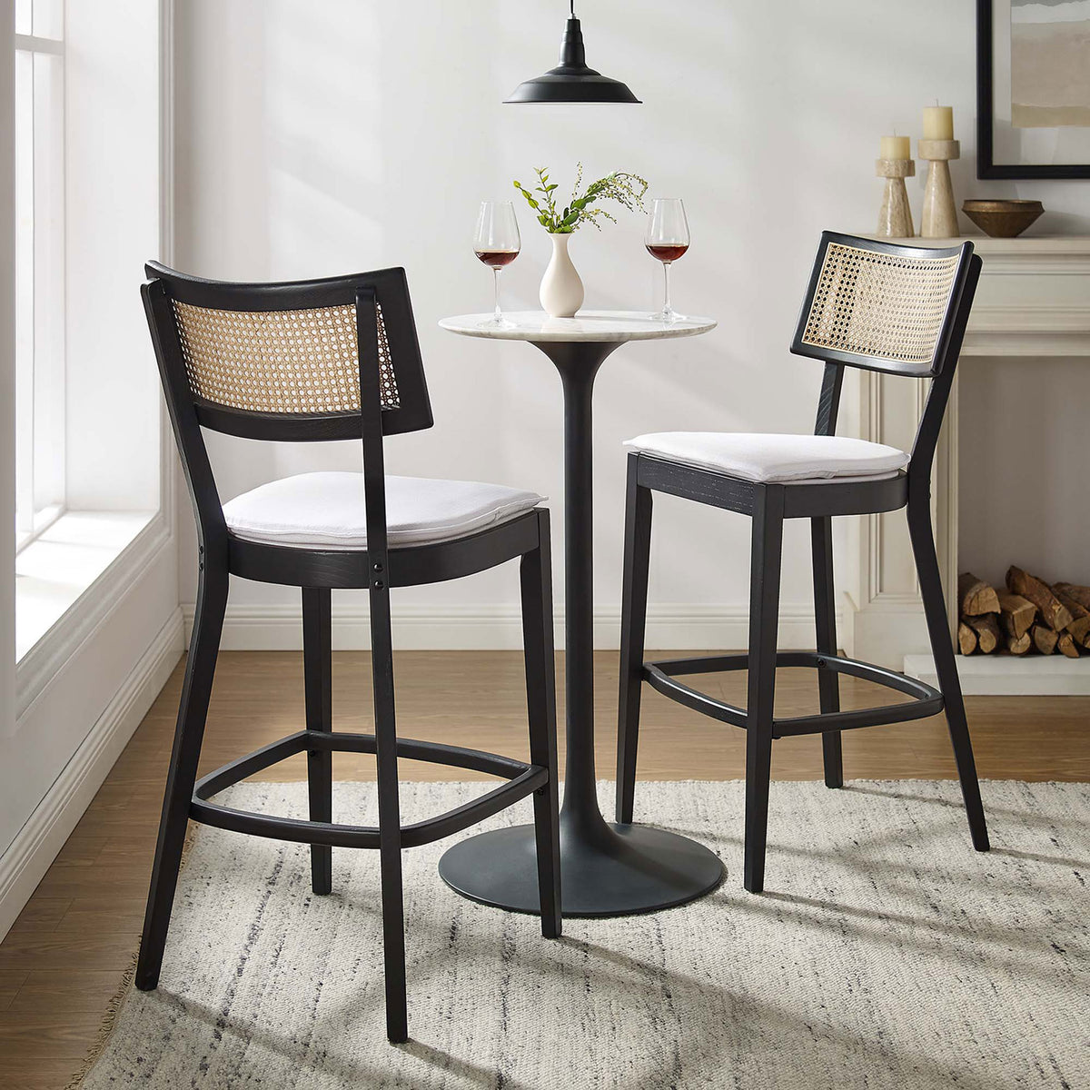 A refined pair of bar stools completes your home bar with warm texture || EEI-6820-BLK-WHI || front_angle_multi_room