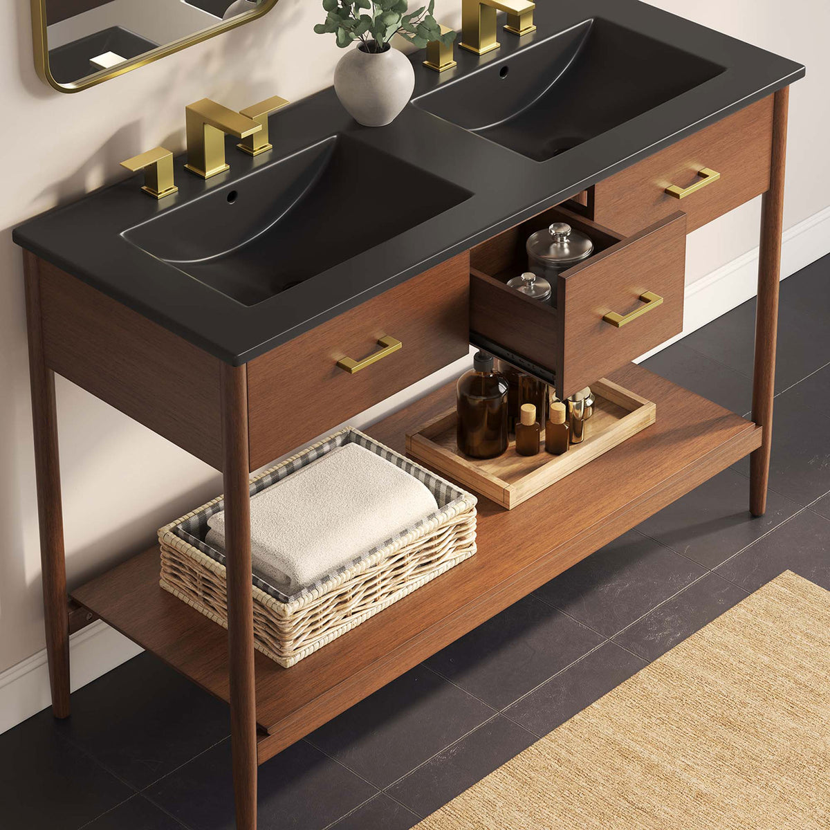Lifestyle scene shows organized storage and brass accents beneath matte black double sinks || EEI-6827-WAL-BLK || front_angle_open_room