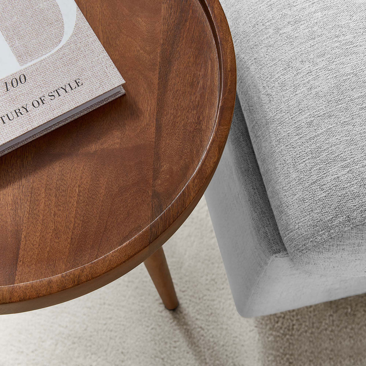 Walnut tray top side table styled next to a modern gray sofa for a warm, functional living room accent || EEI-6830-WAL || detail_room