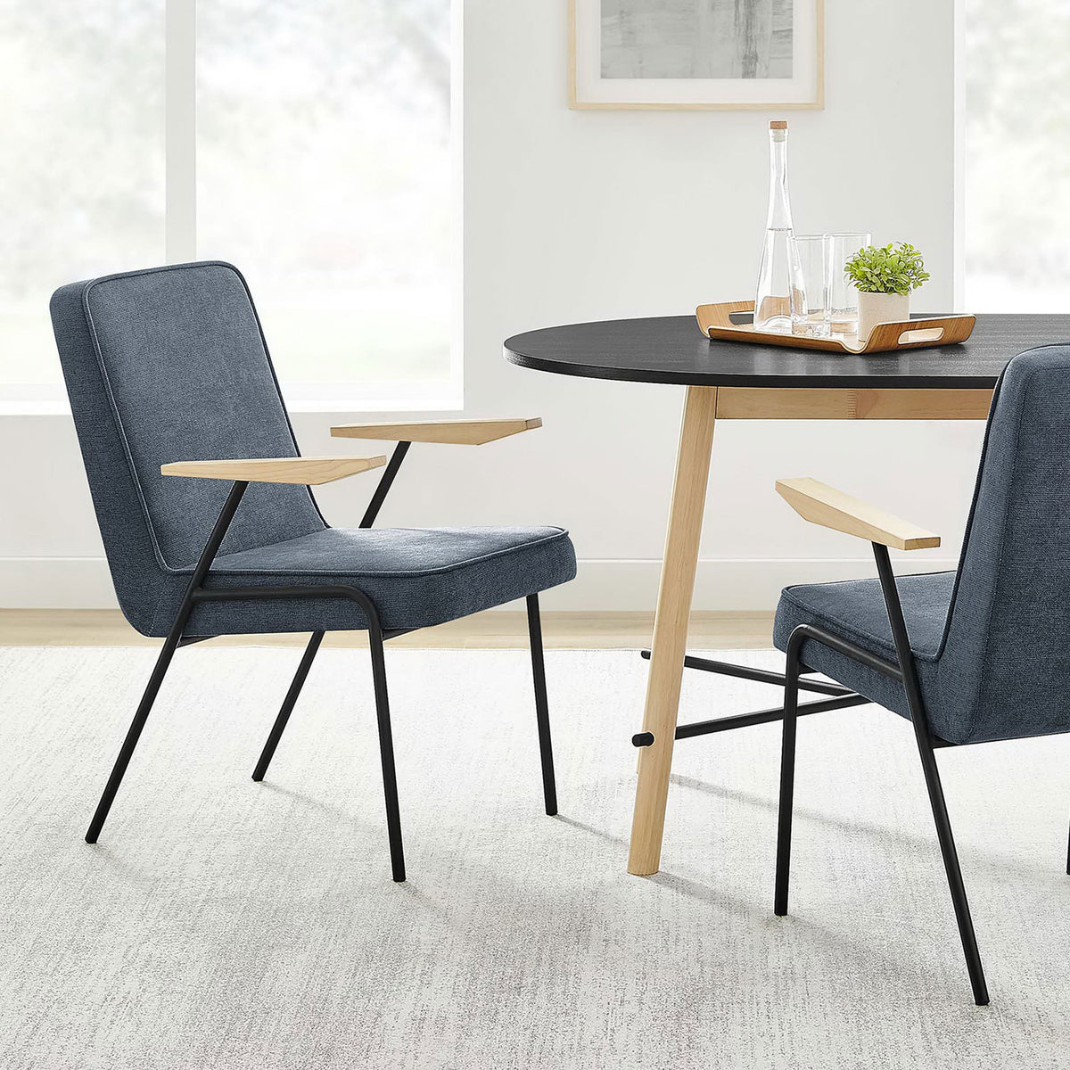 Laguna dining armchairs styled around a modern wood table in a bright, airy dining room || EEI-6835-LAG || front_angle_room