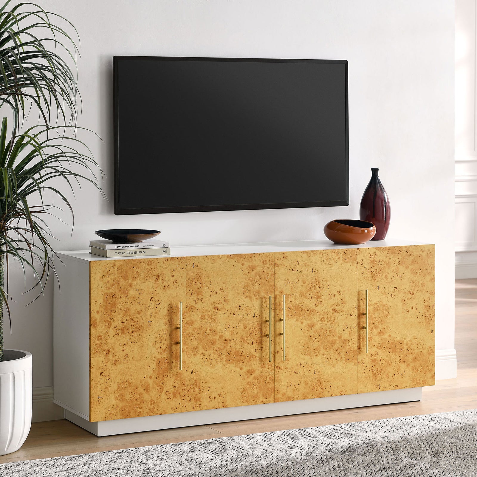 Sideboard styled beneath a wall-mounted TV to anchor a modern living room media setup || EEI-6847-WHI-BUR || front_angle_room