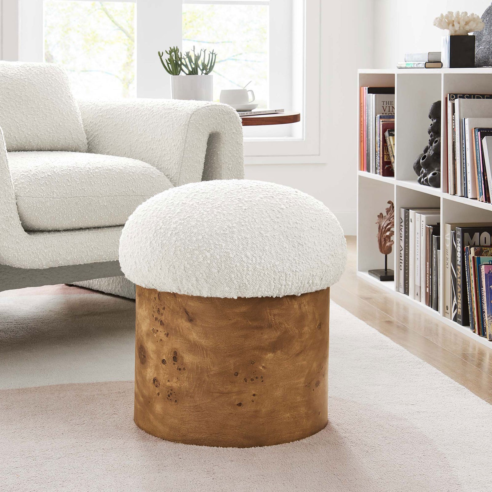 Ivory boucle mushroom ottoman styled in a bright living room beside a modern sofa || EEI-6850-IVO-BUR || front_angle_room