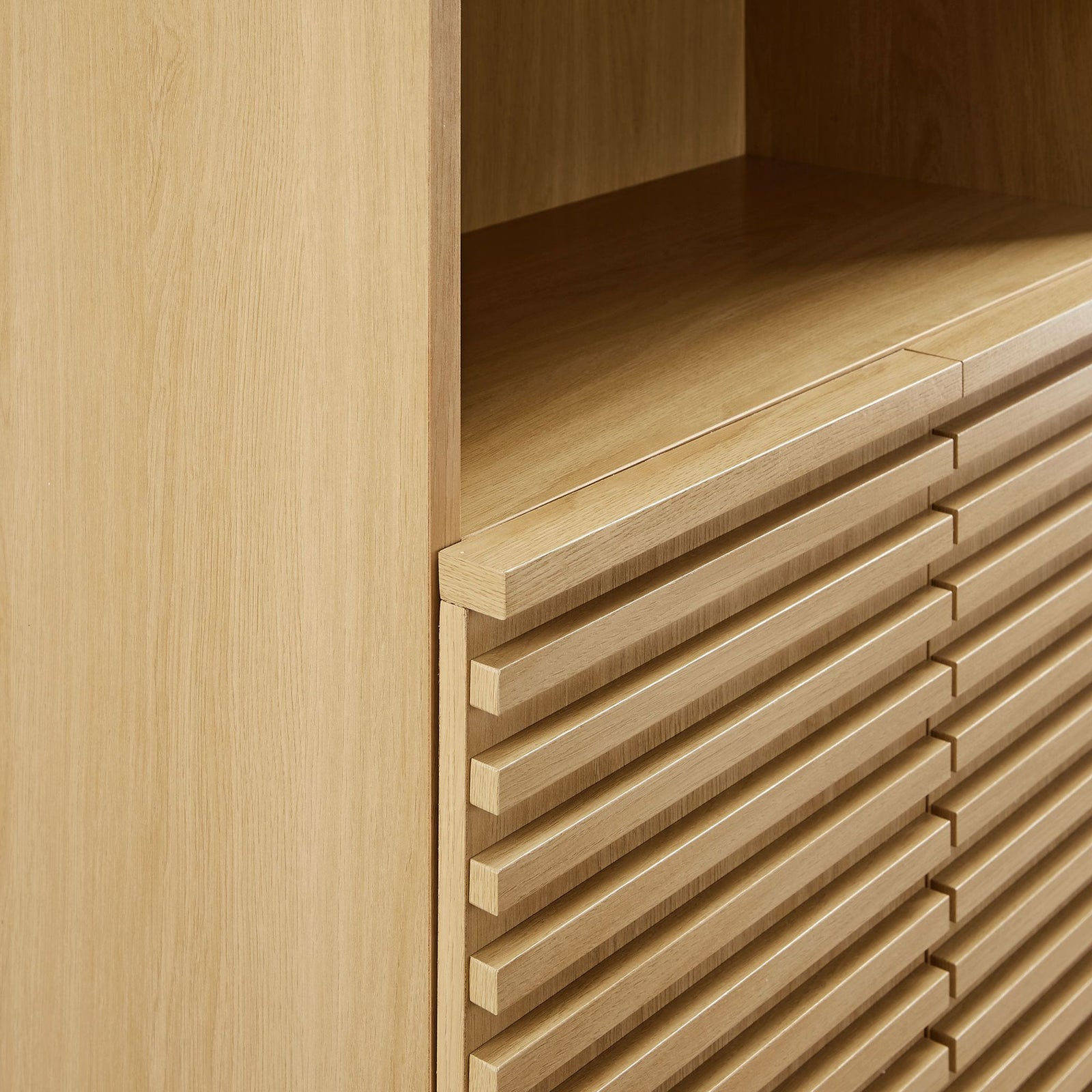 Crisp horizontal slat detailing and smooth wood grain lend striking mid-century texture || EEI-6852-OAK || detail_studio