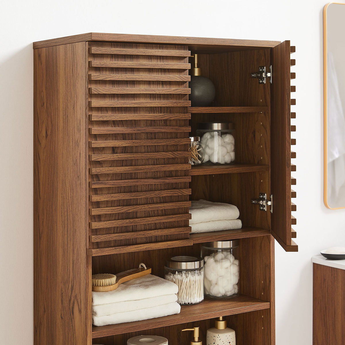 Organized storage with adjustable shelves keeps essentials tucked neatly behind slatted doors || EEI-6852-WAL || storage_open_room