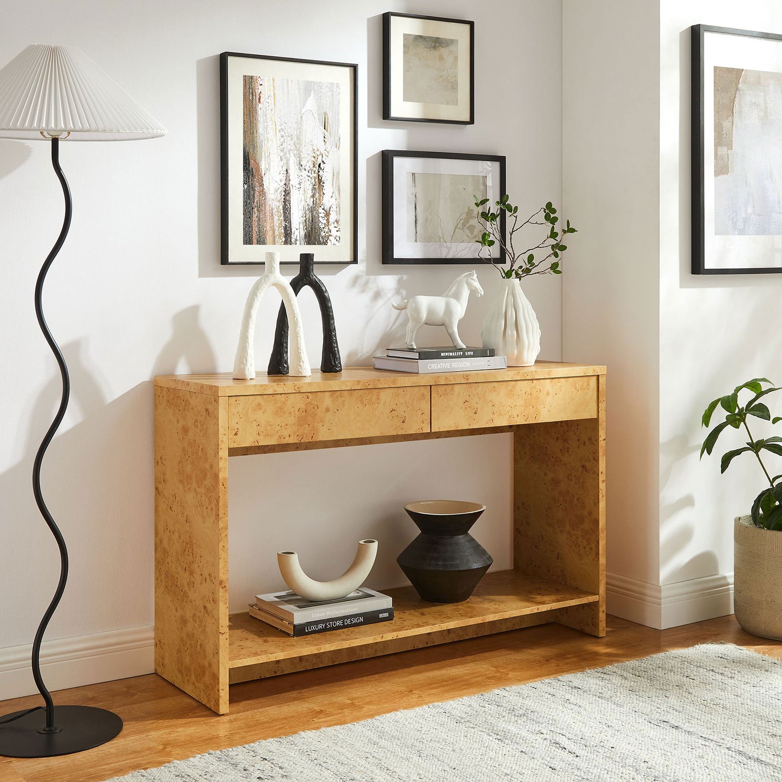 Elevates a modern living space with airy shelving and warm, natural burl character || EEI-6857-BUR || front_angle_room