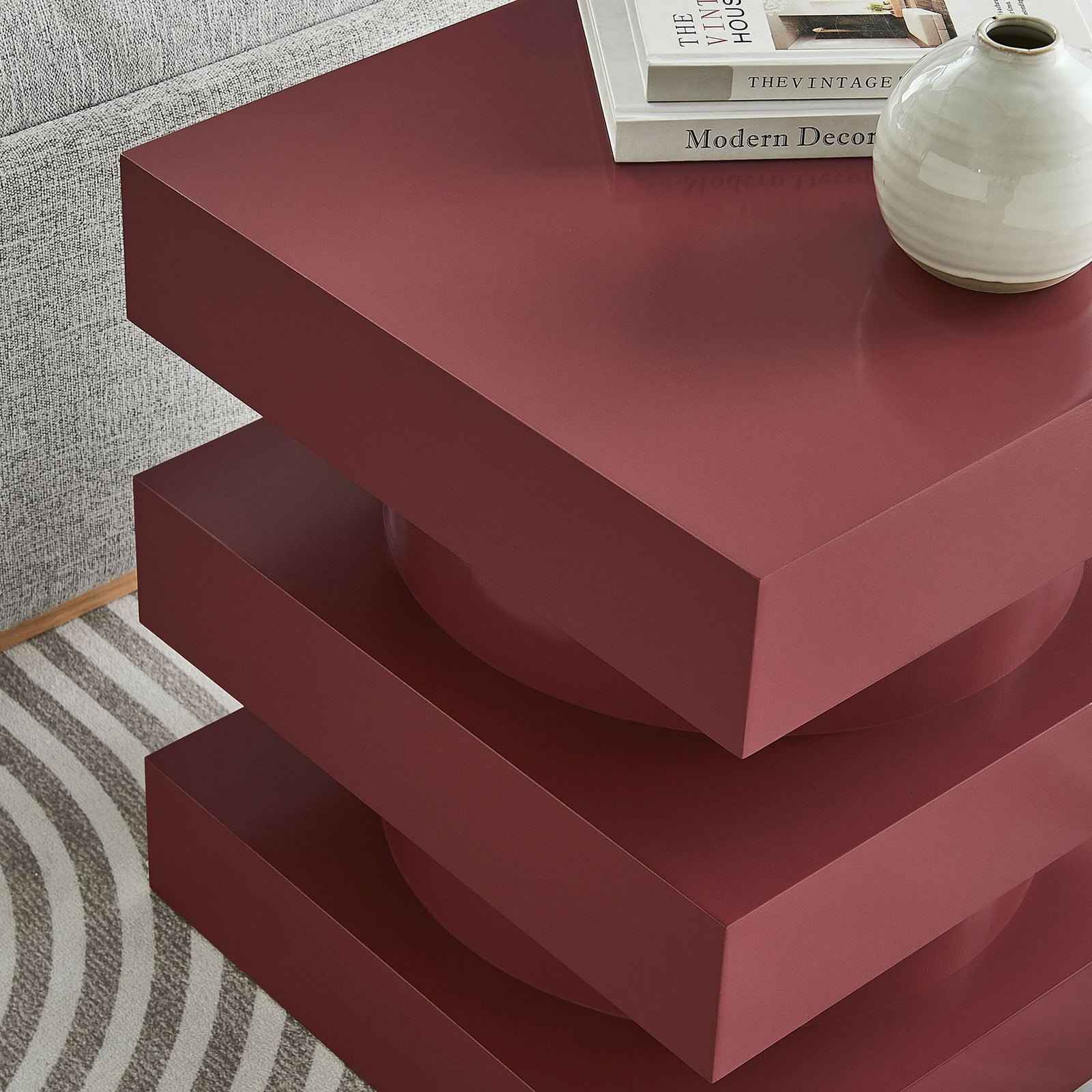 Styled spiced apple end table beside a sofa, perfect for books, decor, or a bedside accent || EEI-6864-SPA || front_angle_room