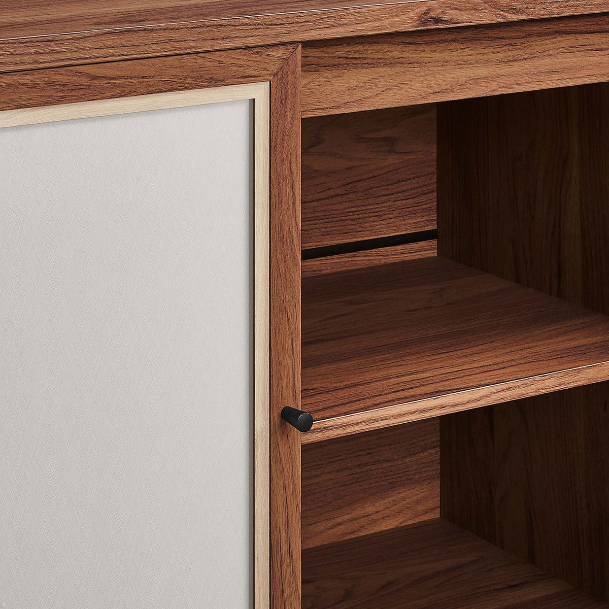Interior shelving of the walnut console offering adjustable storage for media components and decor accents || EEI-6865-WAL || storage_open_studio