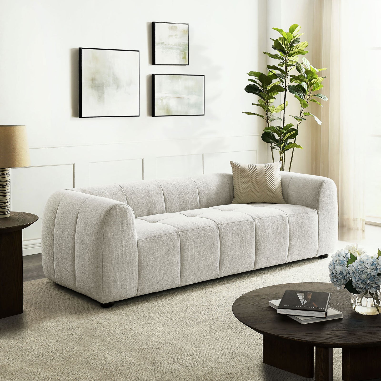 Liana linen sofa styled in a bright living room, pairing deep plush seating with modern minimalist decor || EEI-6866-LIN || front_angle_room