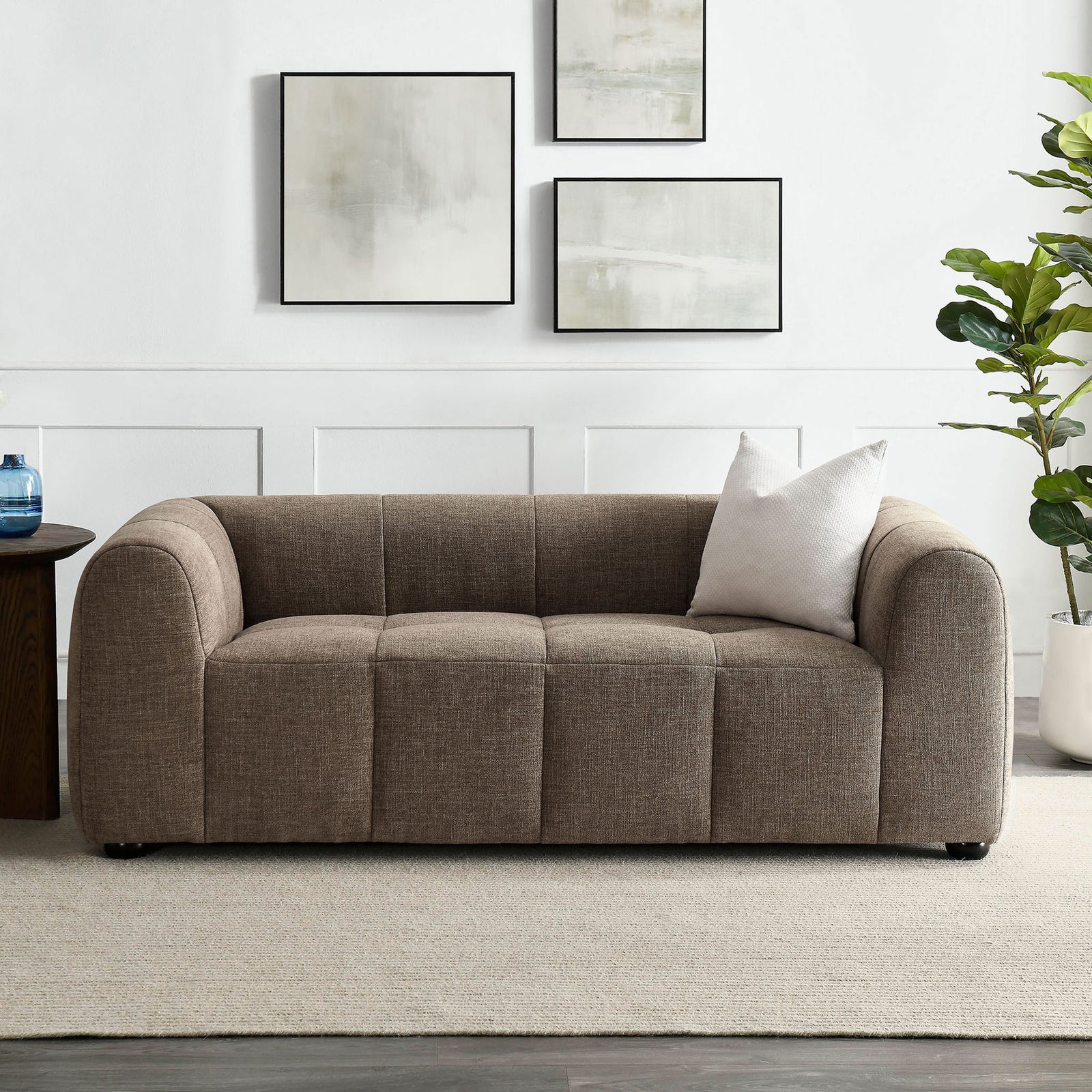 Liana mocha loveseat anchored in a modern living room with deep cushions and inviting, low-slung profile || EEI-6867-MOC || front_room