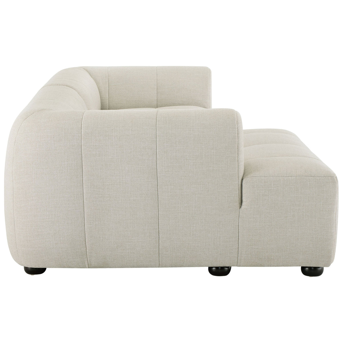 Left-facing linen modular sofa with chaise showing the smooth, rounded silhouette and panel stitching || EEI-6868-LIN || side_studio