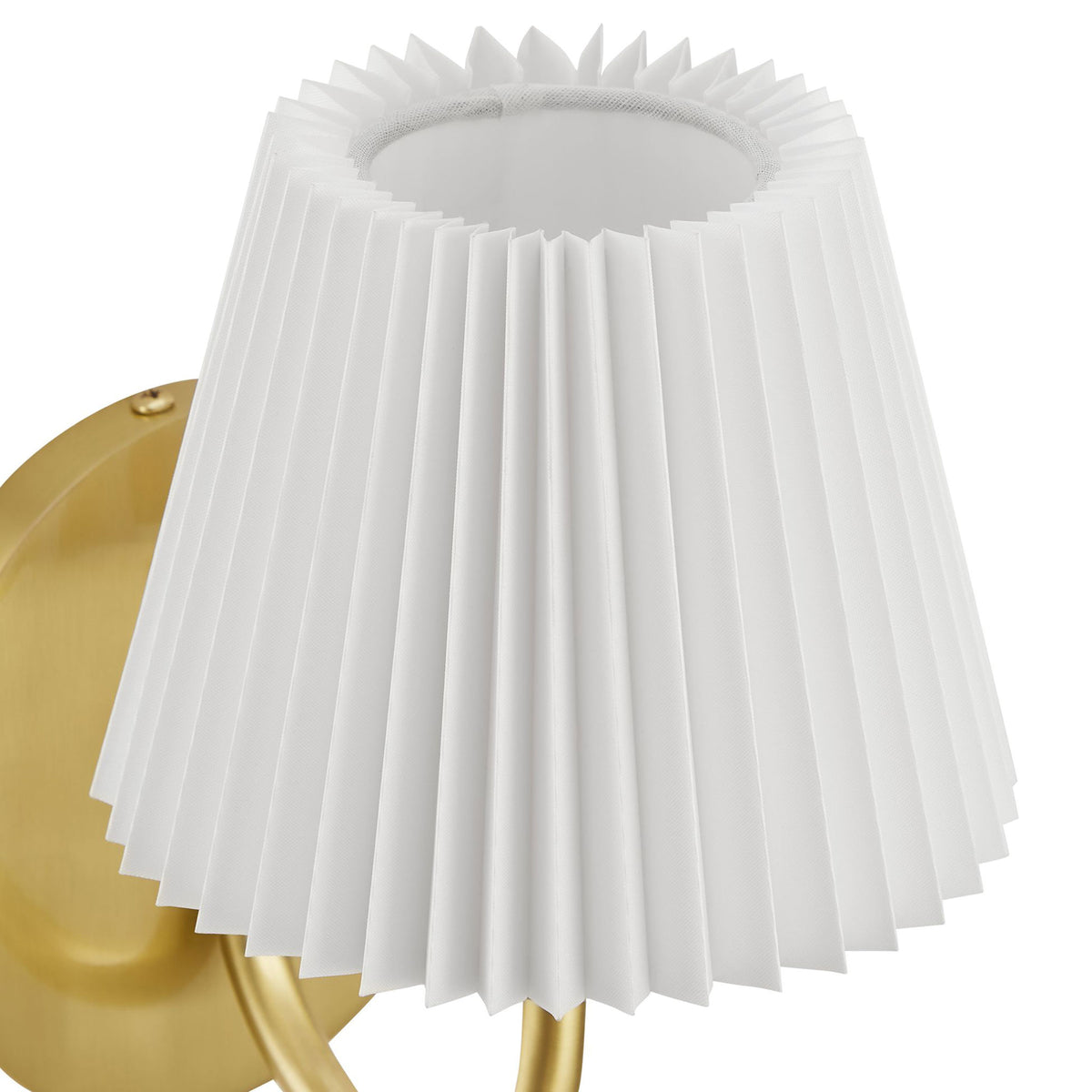 Pleated white shade and warm brass hardware detail showcase the refined texture of this modern wall sconce. || EEI-6872-BRA || shade_studio