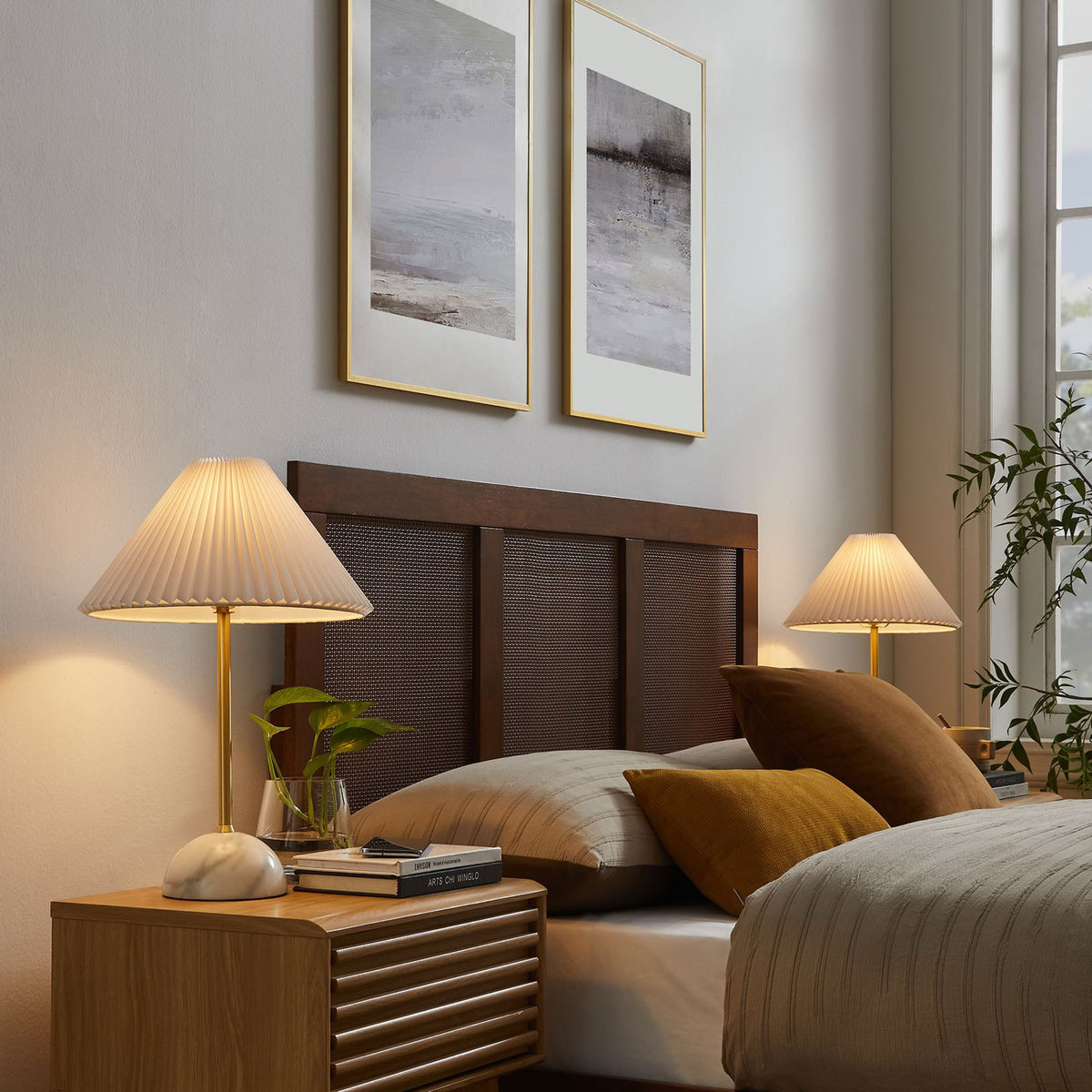 Illusion lamps casting a cozy bedside glow beside layered neutral bedding and wood furniture. || EEI-6878-BRA || front_angle_on_room