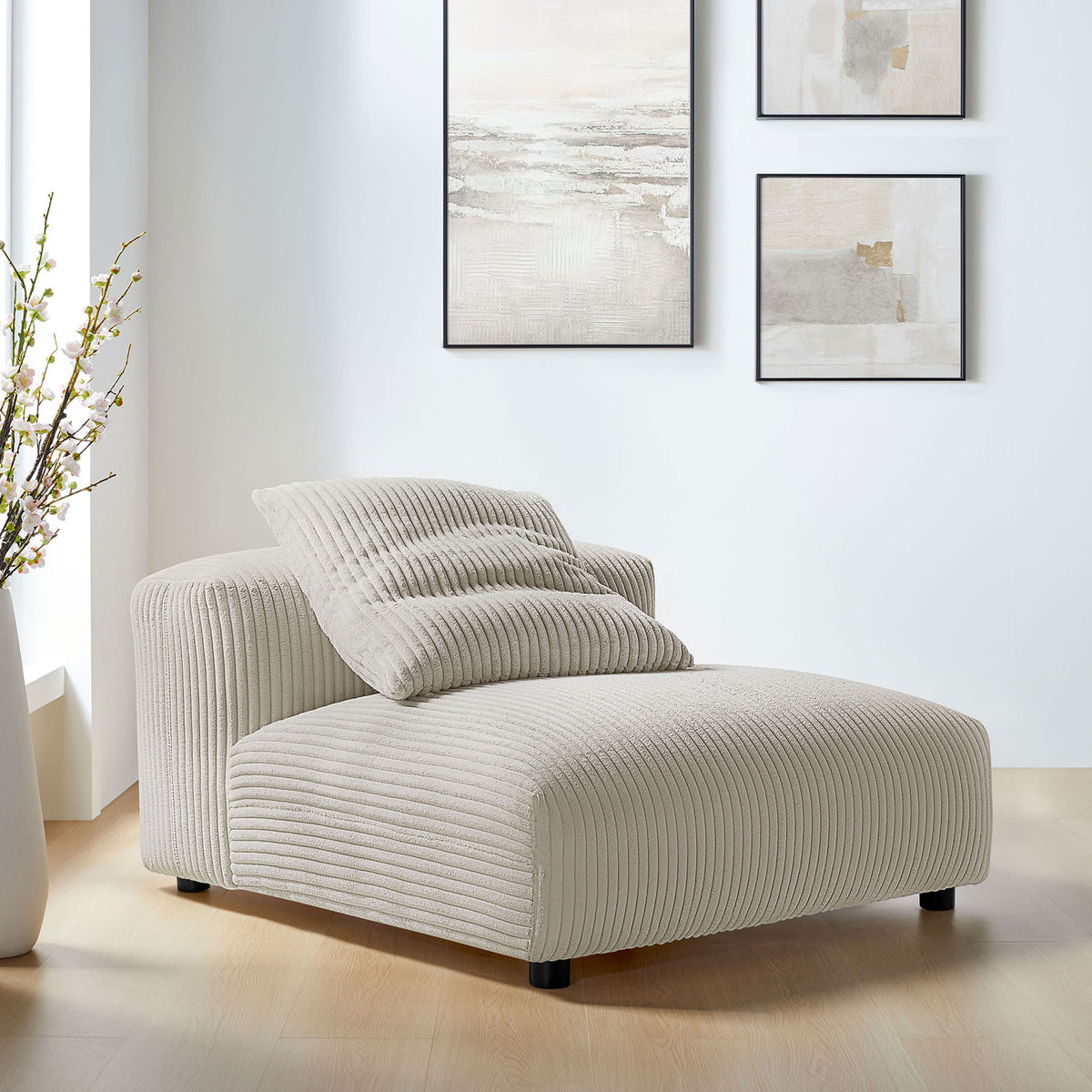 Modern armless lounge chair adds cozy texture to living spaces with almond corduroy and plush pillow || EEI-6884-ALM || front_angle_room