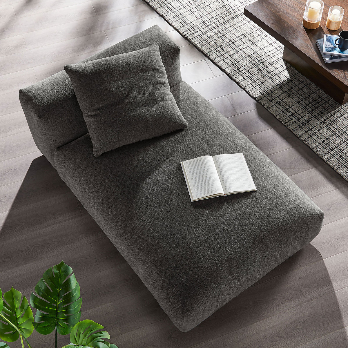 Spacious, armless chaise shows a soft charcoal weave and low-profile legs || EEI-6887-CHA || top_angle_room
