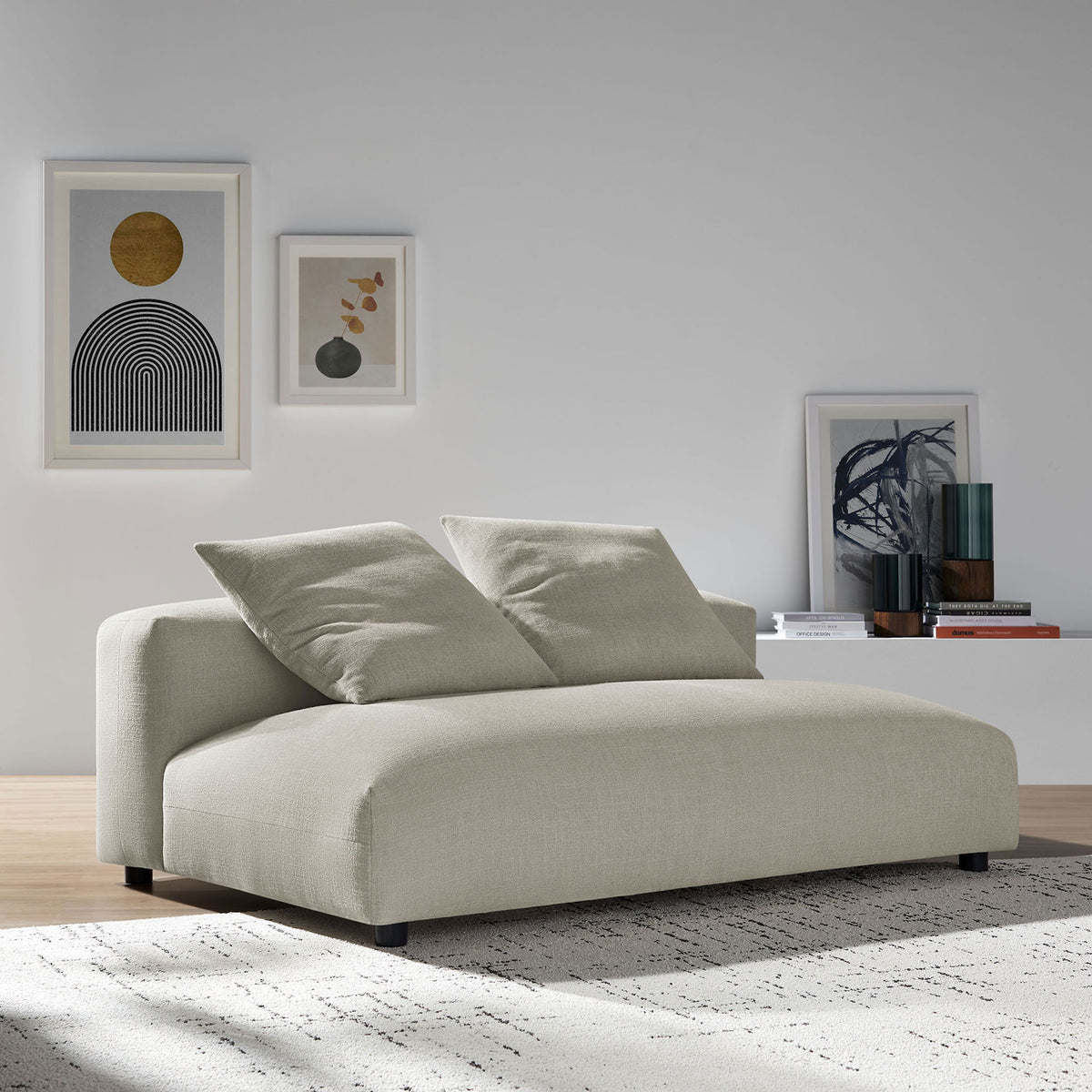 Linen armless loveseat anchors a modern living space with soft curves and inviting, lounge-style seating || EEI-6891-LIN || front_room