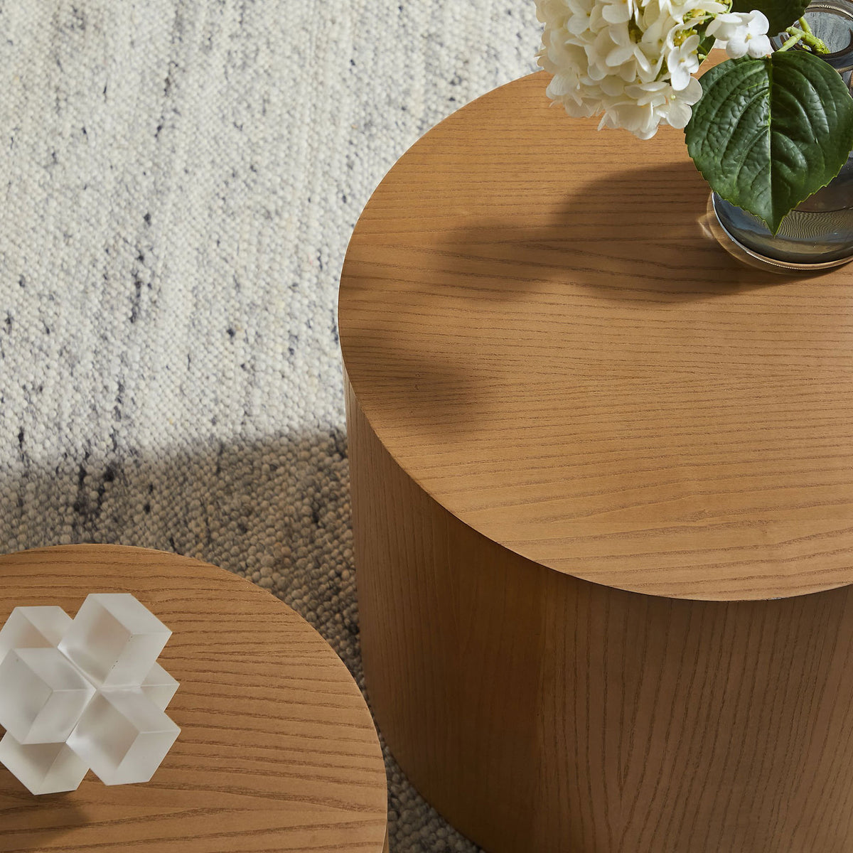 Warm ash wood tops add organic texture beside curated decor in a modern living space || EEI-6893-NAT || detail_room
