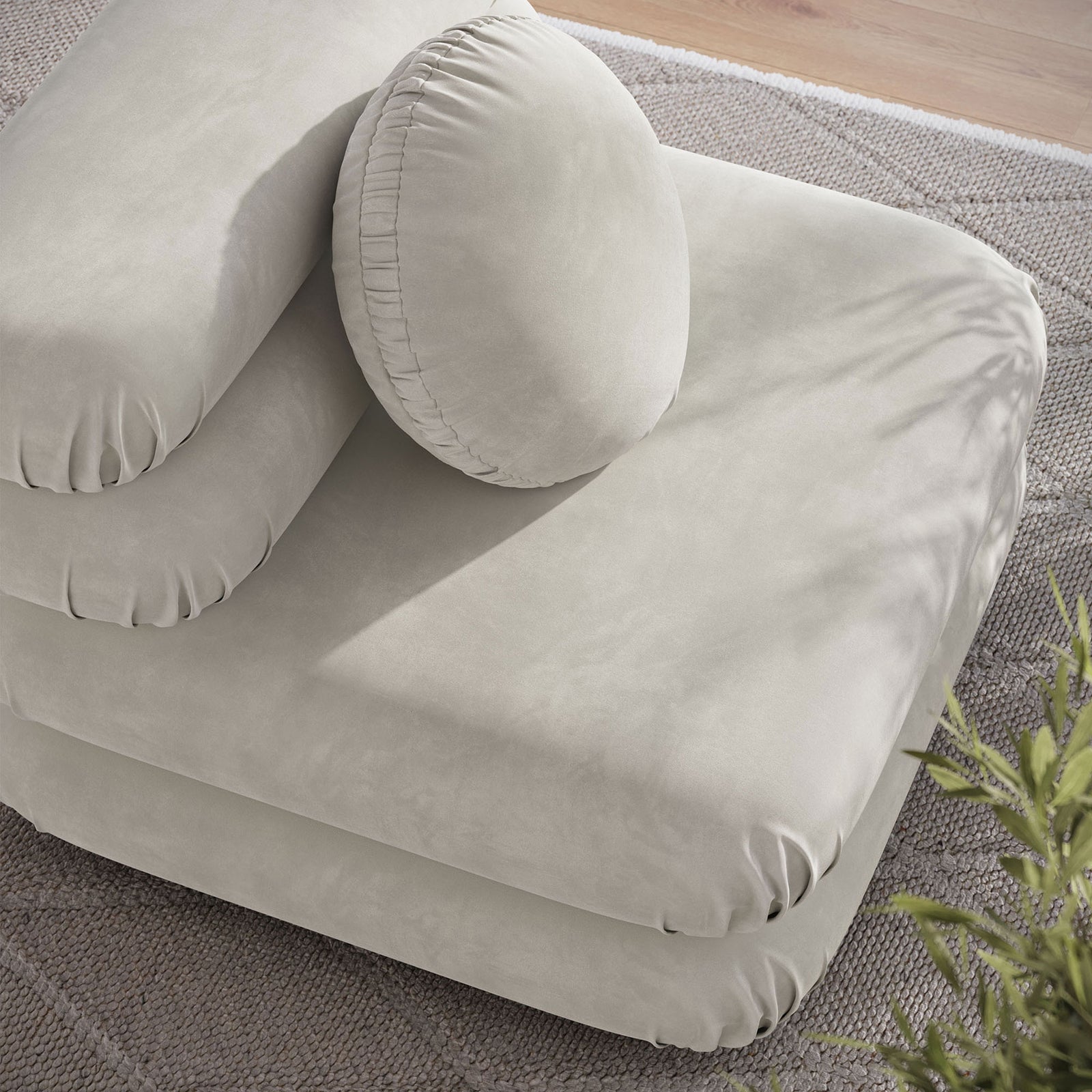 Refined almond velvet pairs with rounded forms for a cozy, sculptural accent || EEI-6896-ALM || detail_room