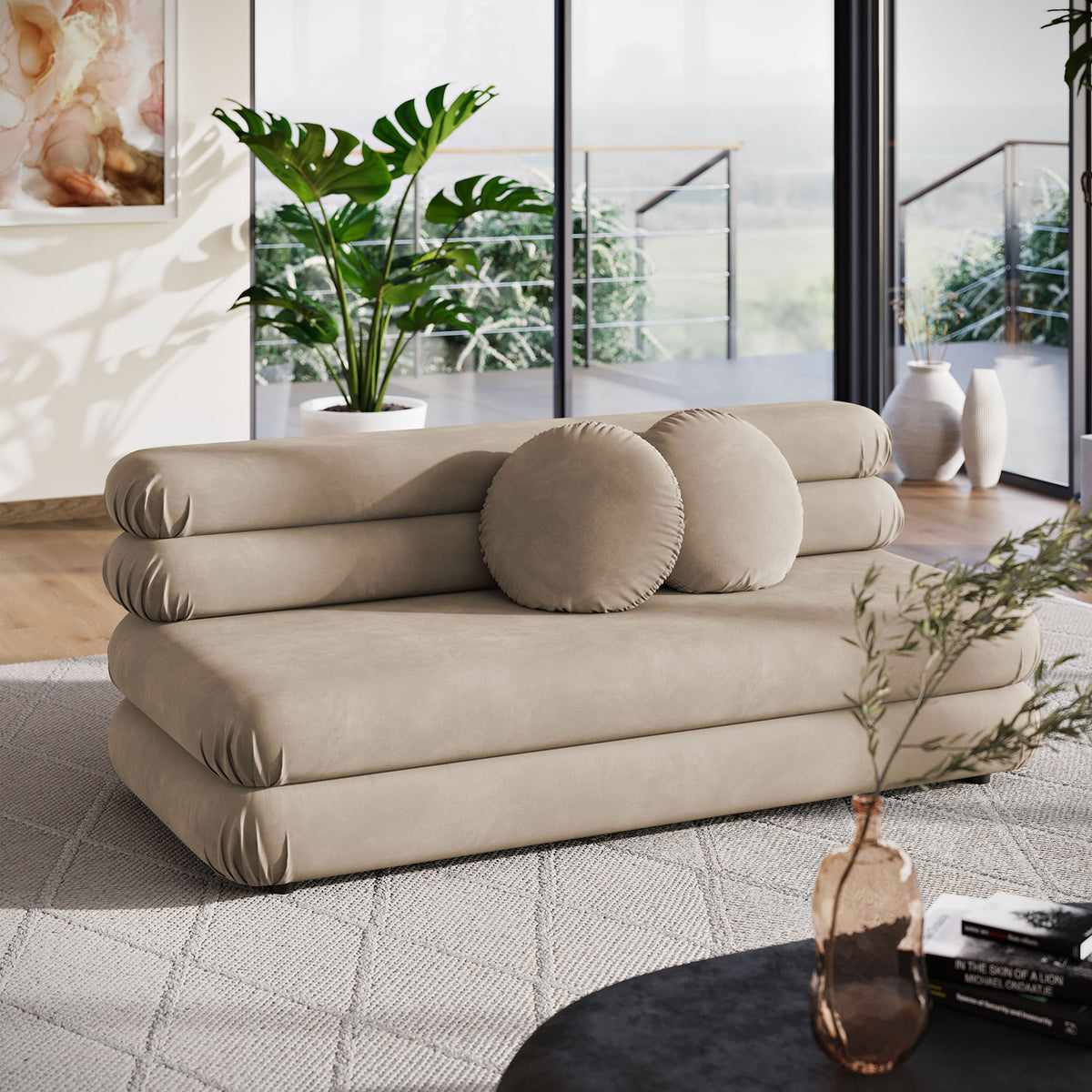 Retro-inspired taupe velvet loveseat with round pillows brings soft curves to an airy lounge || EEI-6897-TAU || front_angle_room