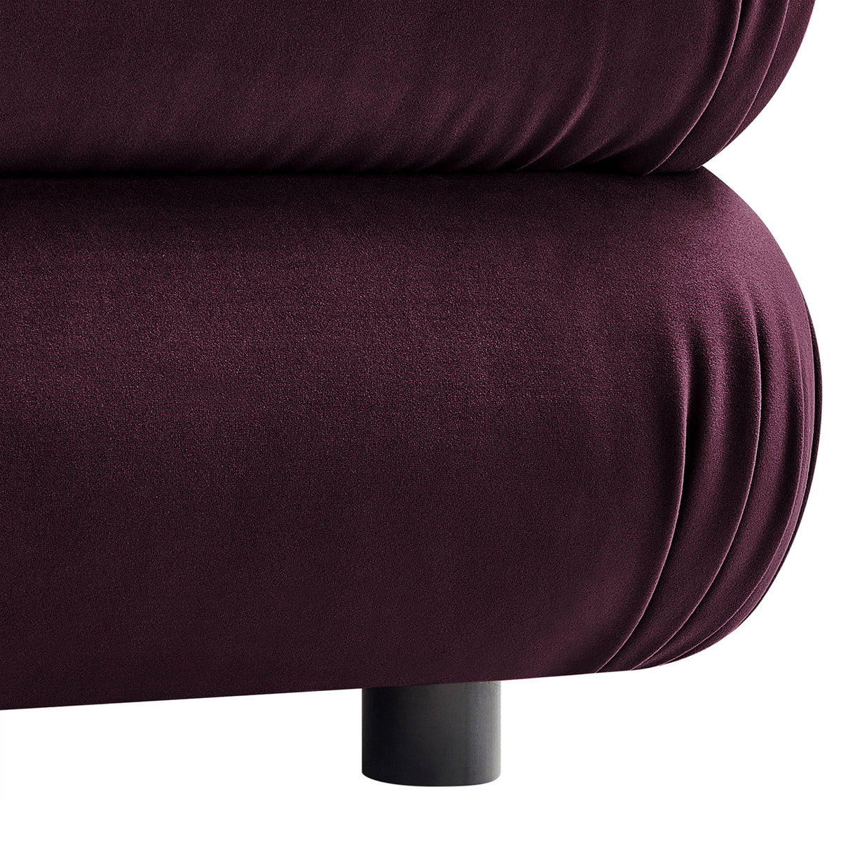 Close-up of the ottoman base highlighting the gathered velvet upholstery and low black support leg || EEI-6899-MUL || leg_studio