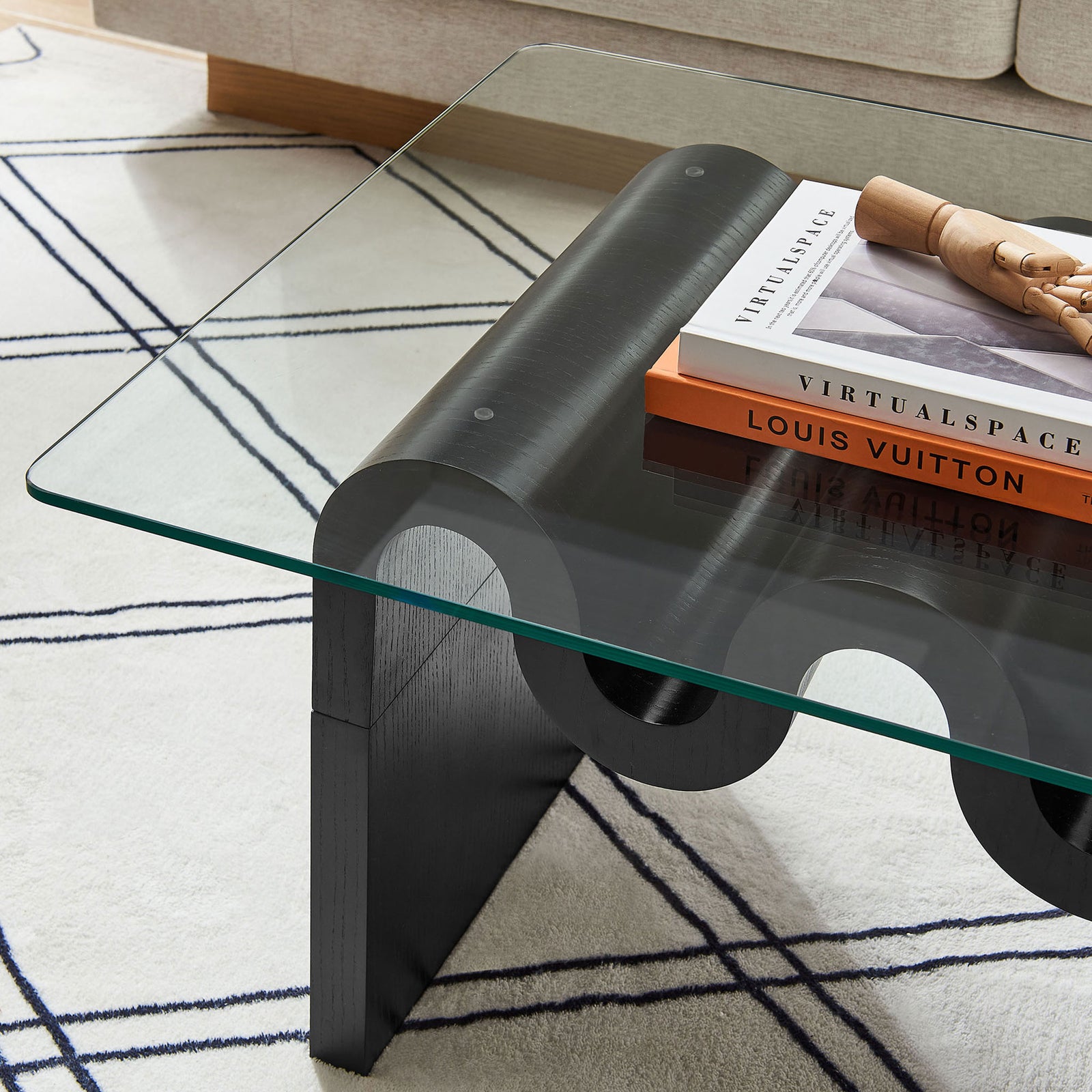 Spacious tempered glass surface with rounded edge sits over the flowing wave base. || EEI-6900-BLK || detail_room