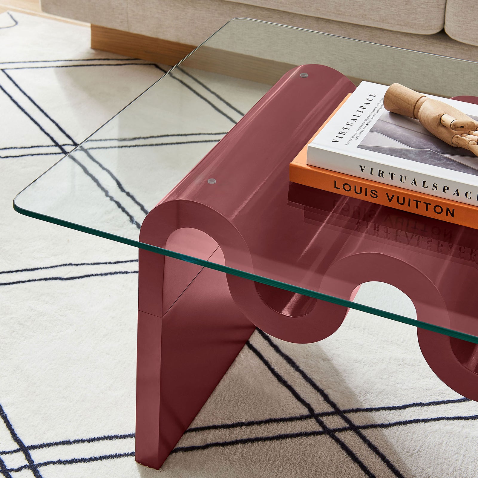 Crisp glass edge and richly finished wave base with books on top || EEI-6900-SPA || detail_room