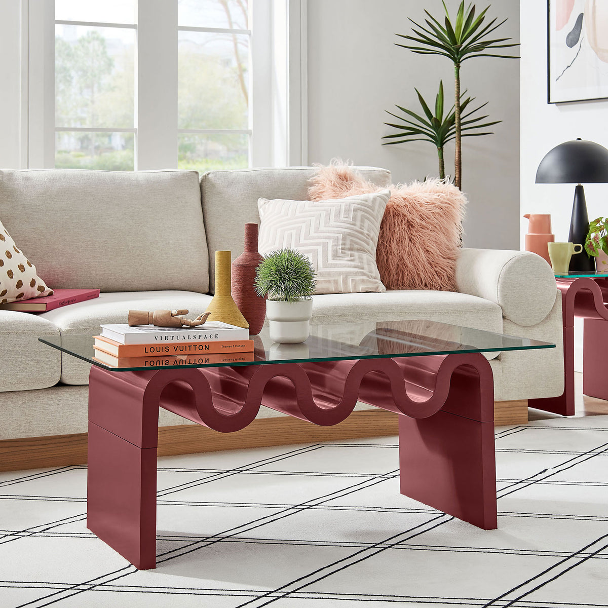 Statement coffee table adds a modern pop of spiced apple color with a clear glass top to the living room || EEI-6900-SPA || front_angle_room