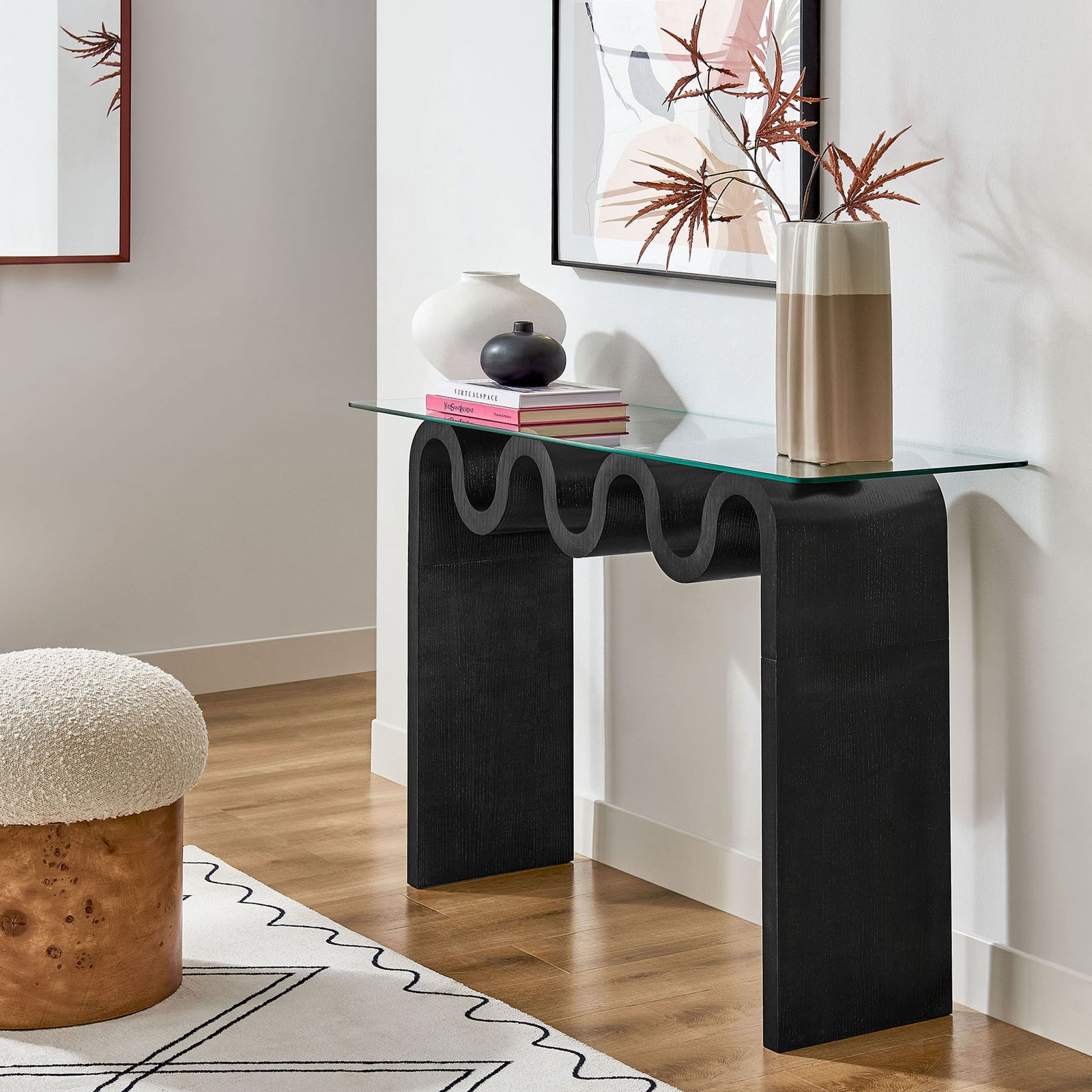 Statement console adds sculptural movement to entryways and living spaces. || EEI-6901-BLK || front_room