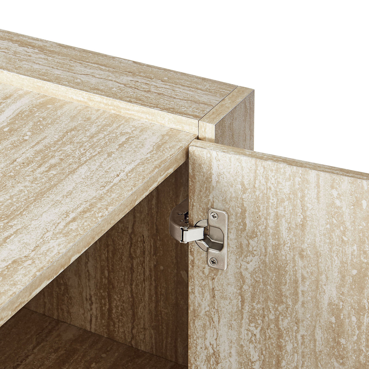 Close-up of concealed hinge and travertine laminate finish on the cabinet door || EEI-6906-TRA || detail_studio