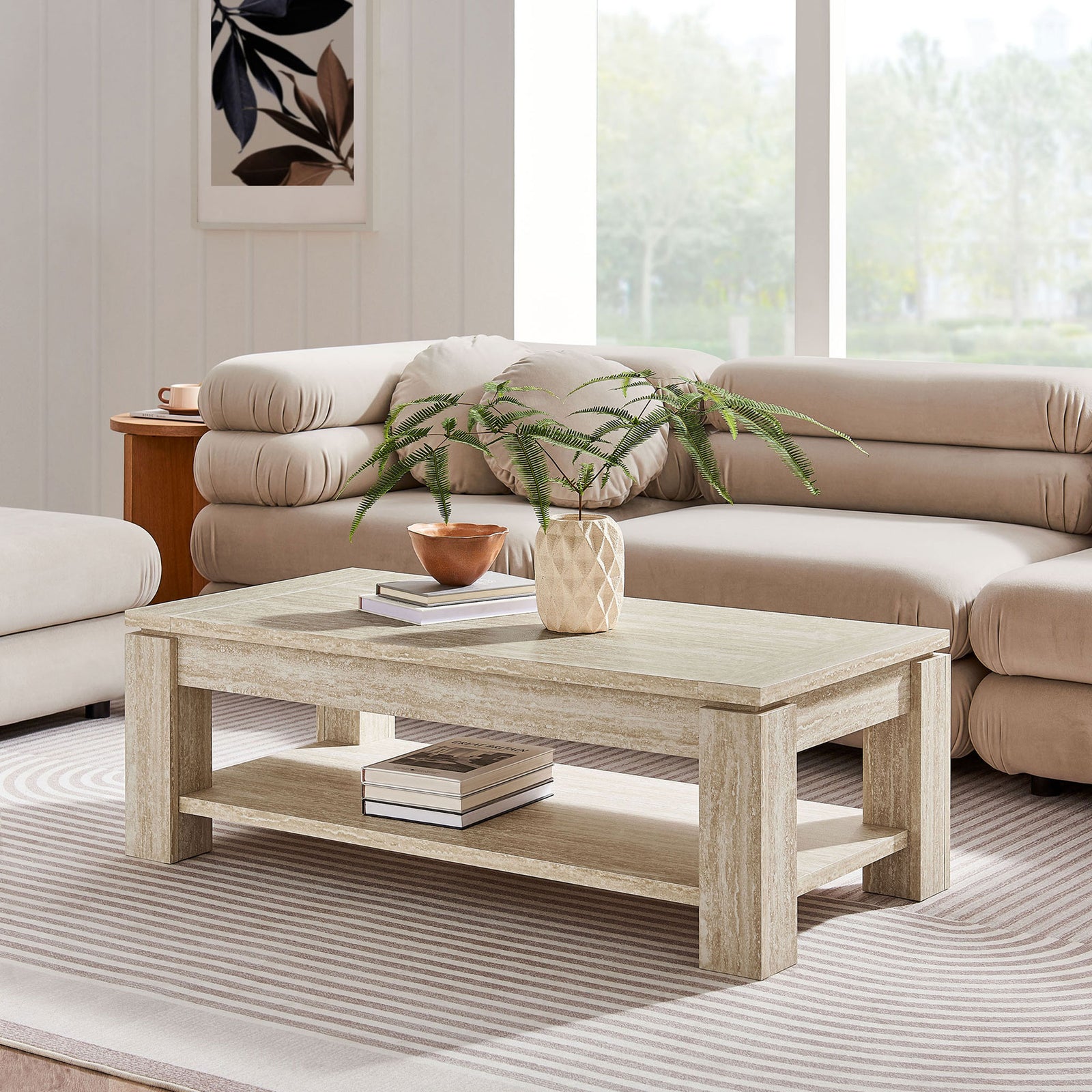 Low-profile coffee table with travertine-look finish and lower shelf anchors a cozy living space || EEI-6908-TRA || front_angle_room