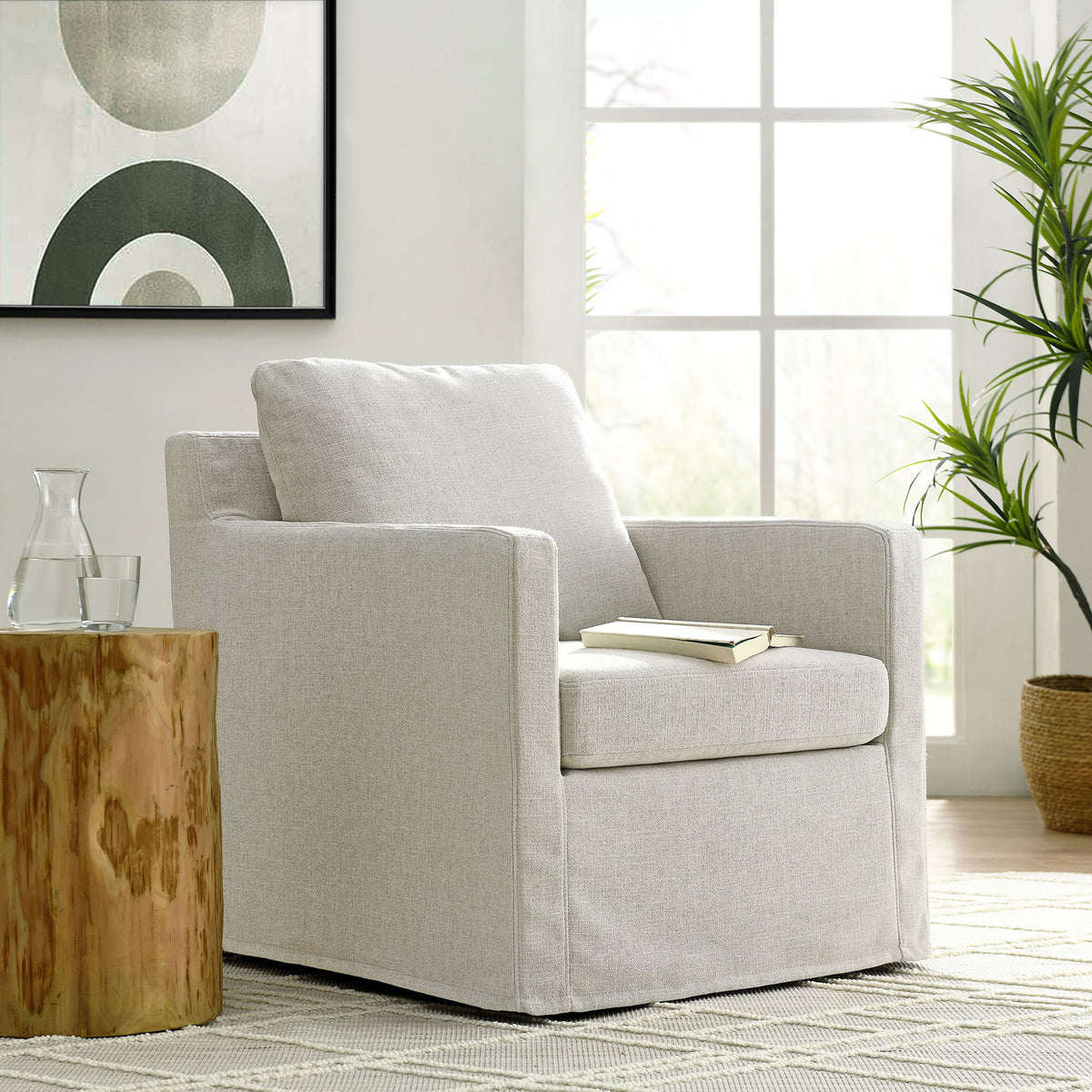 Elevate your living space with a cozy, swivel armchair wrapped in easy-care, linen-look slipcover || EEI-6910-LIN || front_angle_room