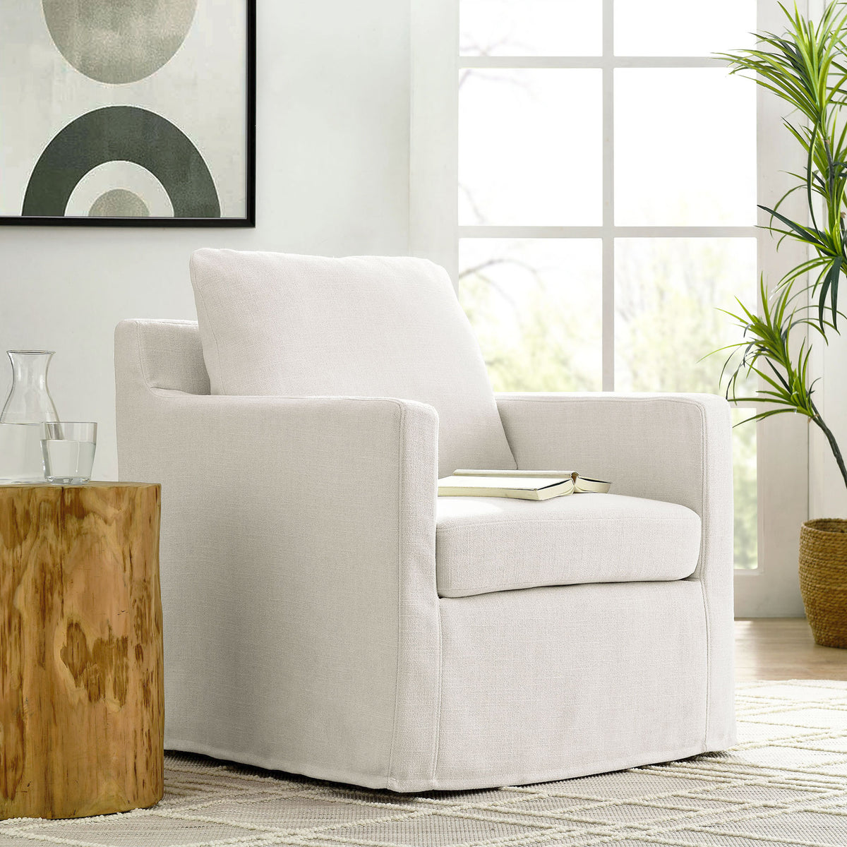 Versatile swivel armchair adds inviting comfort to living spaces with a clean, casual silhouette || EEI-6910-SAL || front_angle_room