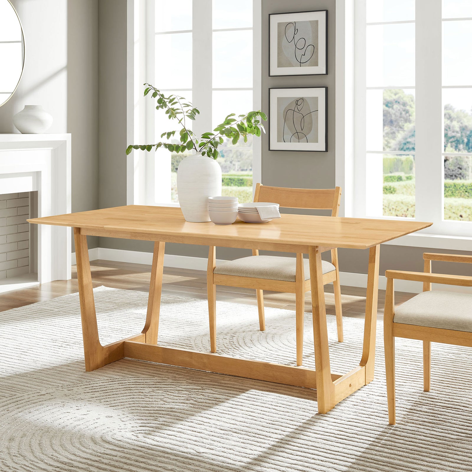 Natural wood dining table anchors the dining room with warm mid century inspired style || EEI-6914-NAT || front_angle_room