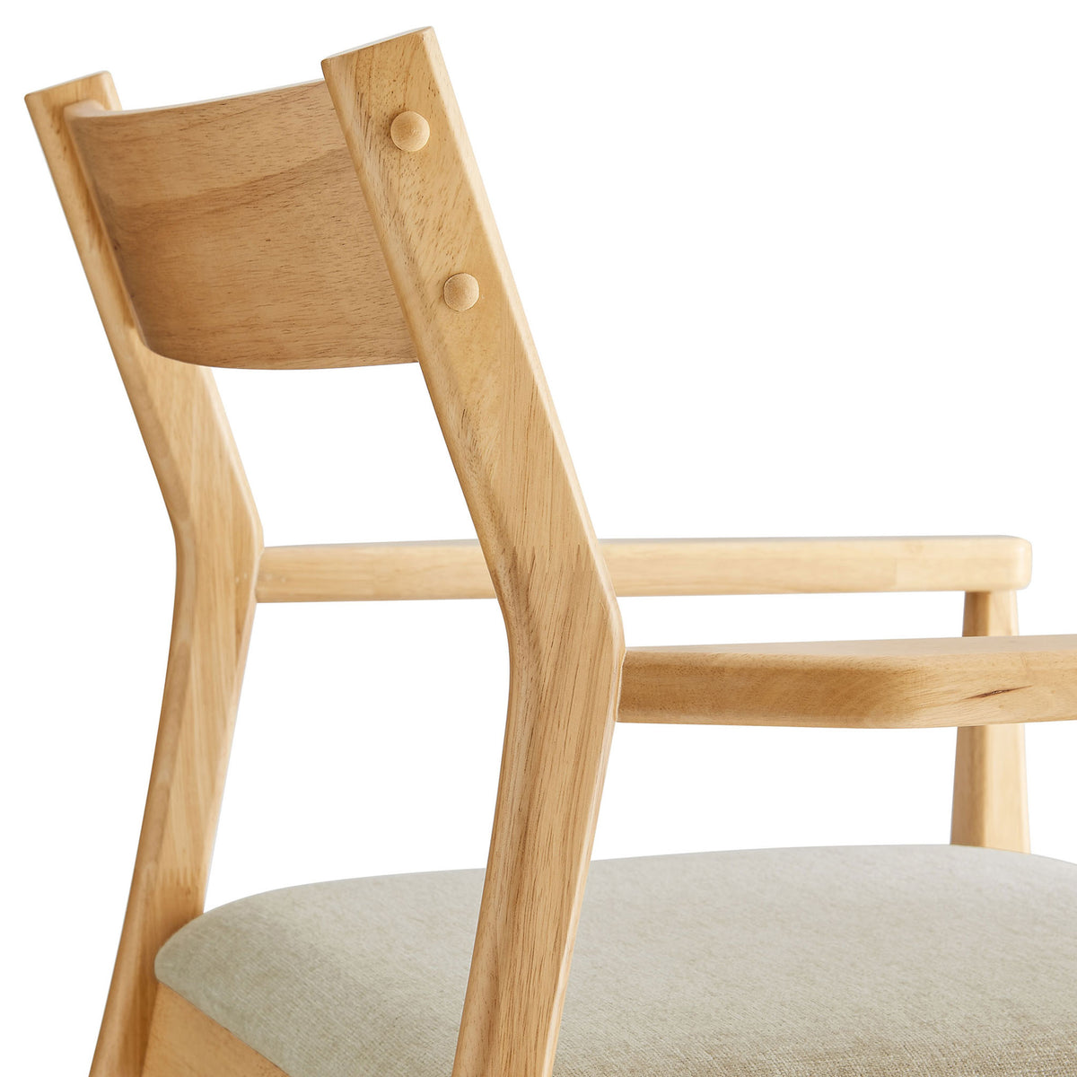 Crafted Solara chair back with sculpted wood frame, rounded dowel accents, and soft cushioned seat. || EEI-6916-NAT-HEB || detail_studio