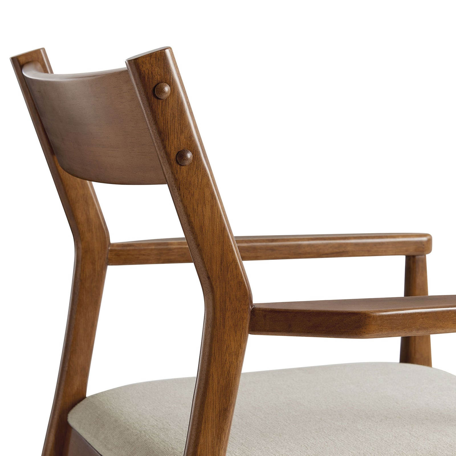 Walnut-finished chair frame with rounded backrest panel and button accents meeting the cushioned beige seat || EEI-6916-WAL-HEB || detail_studio