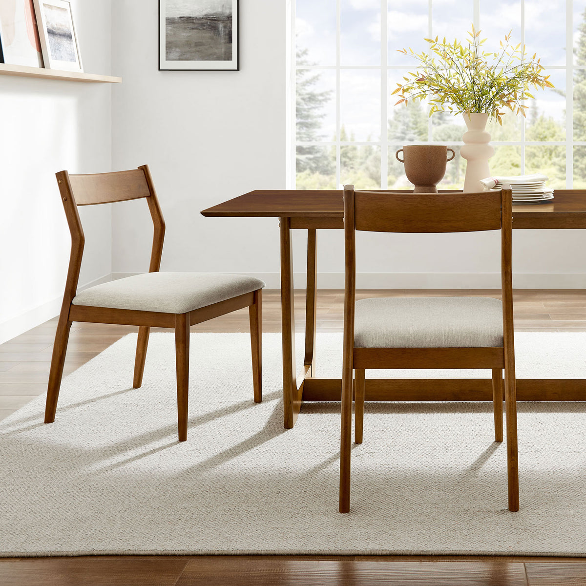 Set of two walnut dining chairs around a matching table for an inviting, airy dining room || EEI-6918-WAL-HEB || side_multi_room