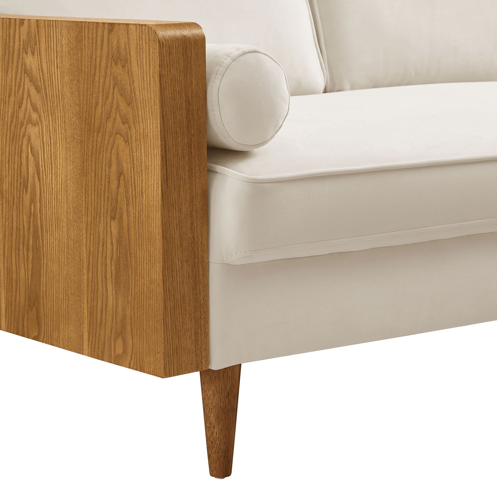 Rounded walnut arm, bolster pillow, and tapered leg highlight the tailored details of this cream sofa || EEI-6944-WAL-ALA || detail_studio