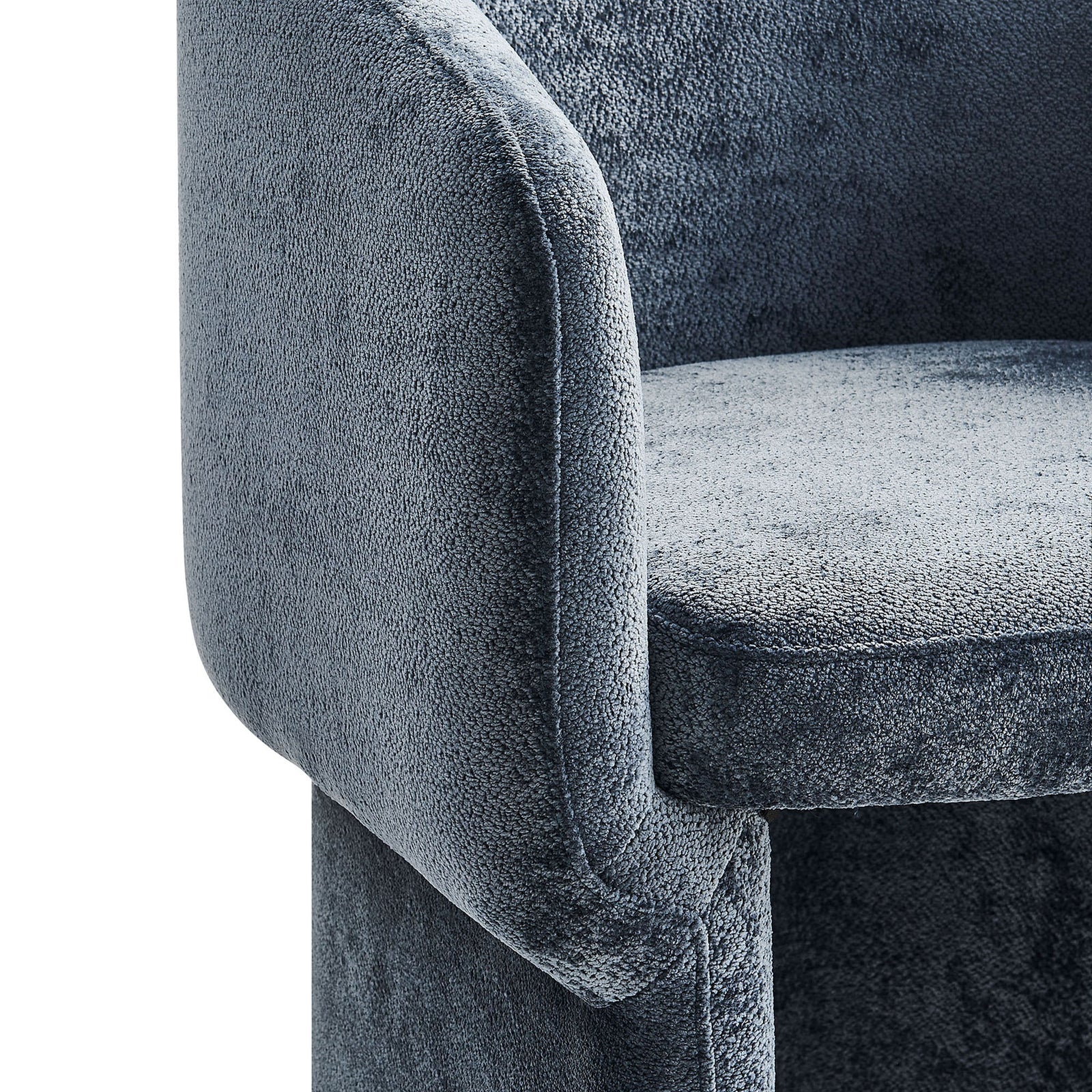 Curved arm detail highlighting soft chenille texture on the slate blue barrel dining chair || EEI-6951-SLA || detail_studio