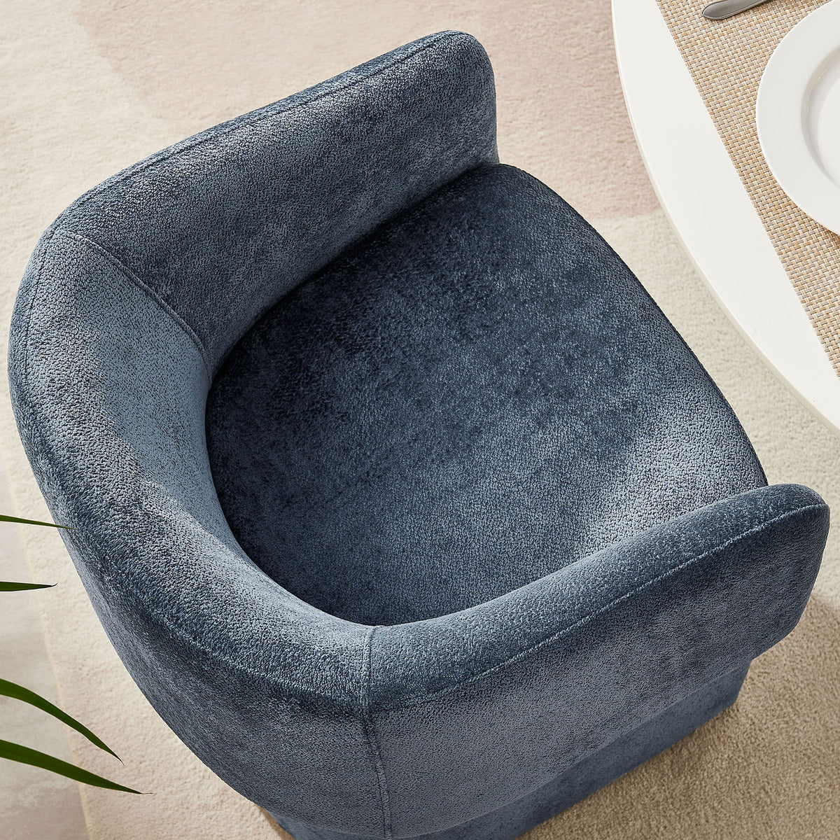 Curved barrel back seat showing generous interior space and plush cushioning in slate blue chenille || EEI-6951-SLA || top_room
