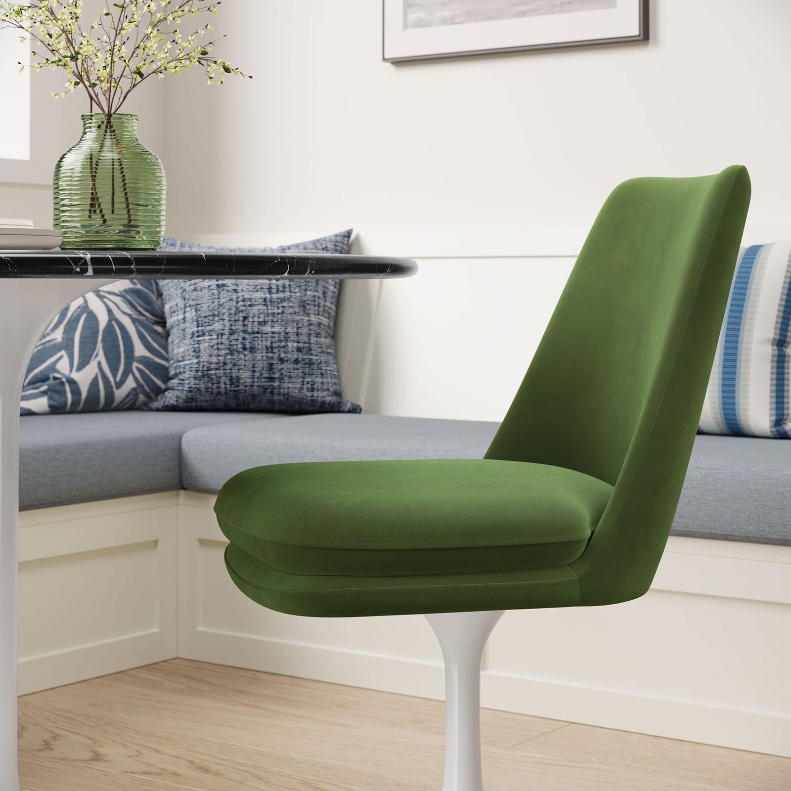 Moss green velvet pedestal chair tucked beside a cozy banquette with layered blue pillows || EEI-6954-WHI-MOG || side_room