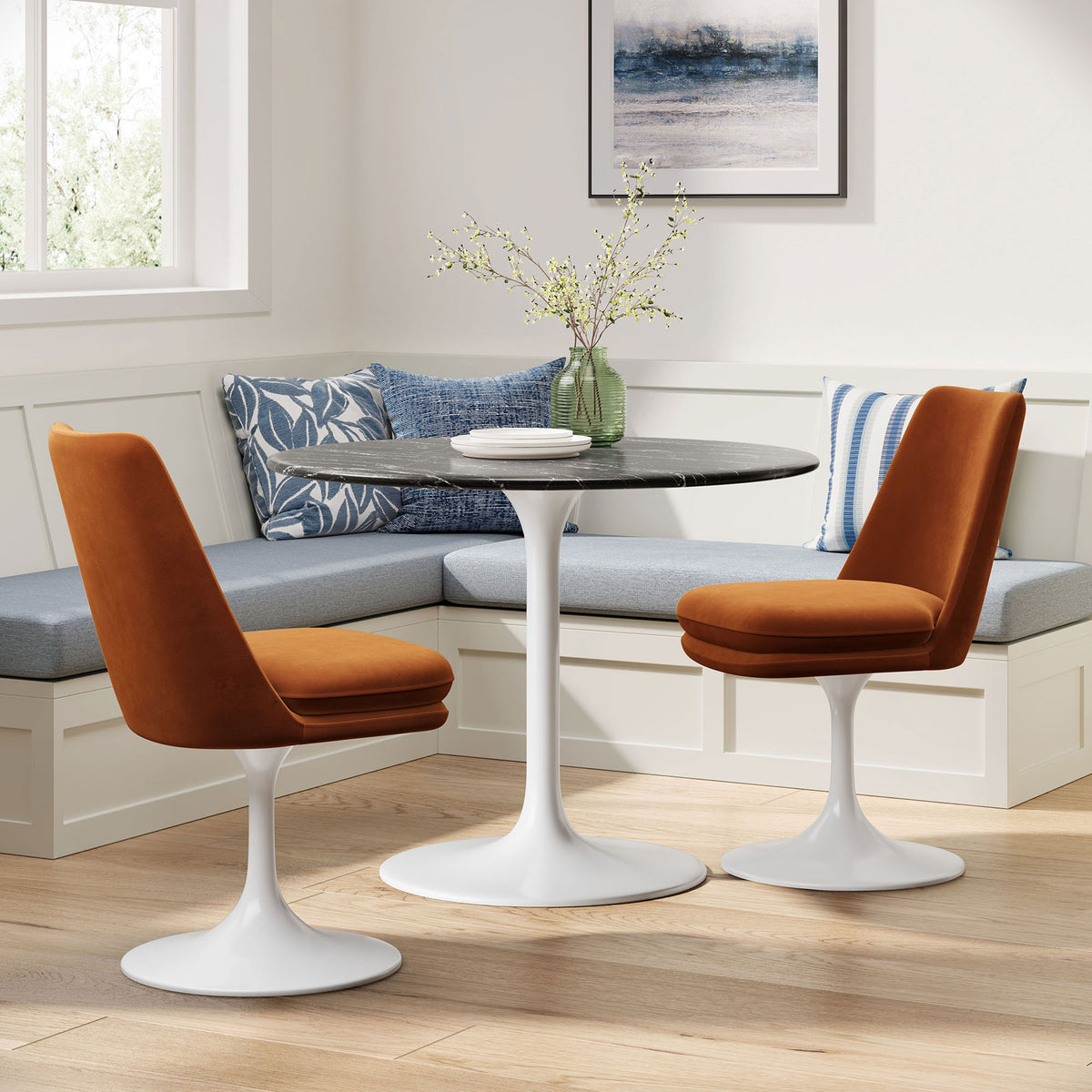 Pair of rust velvet Lippa chairs create a cozy modern dining corner with the matching pedestal table || EEI-6954-WHI-RUS || front_angle_room