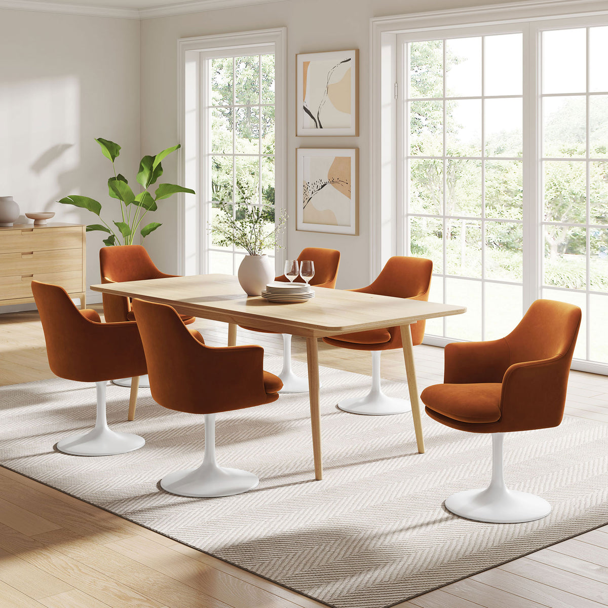 Lippa rust velvet swivel armchairs gather around a light wood table in a bright modern dining room || EEI-6957-WHI-RUS || front_angle_room