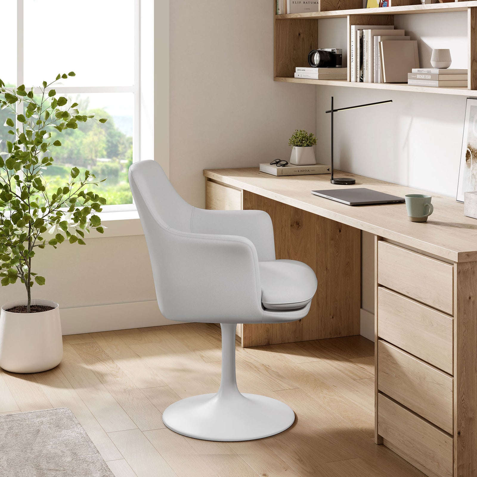 White vegan leather swivel armchair styled as a modern desk chair in a bright home office || EEI-6958-WHI-WHI || front_angle_room